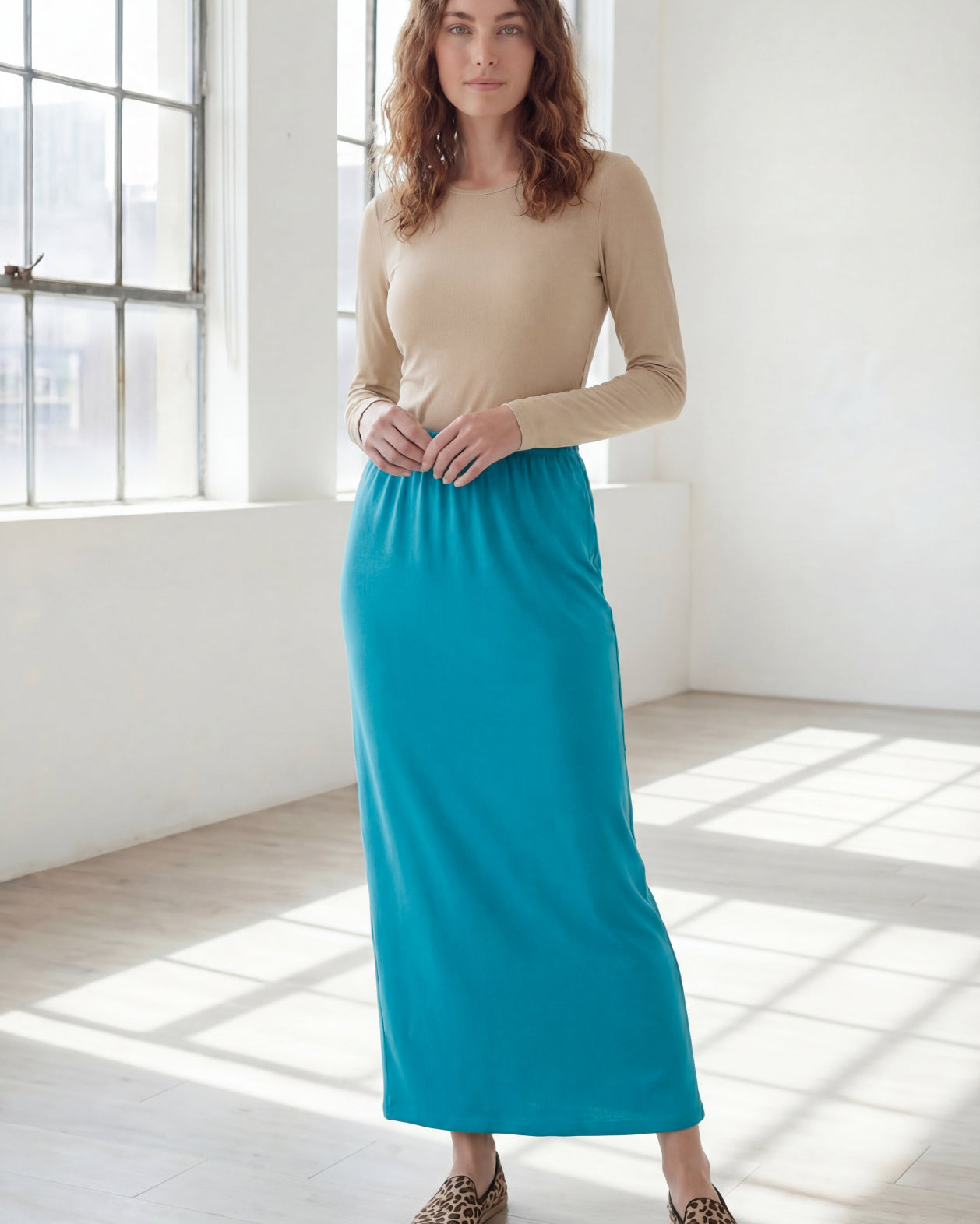 Model wearing Nuggles® 36" Classic Skirt in Teal