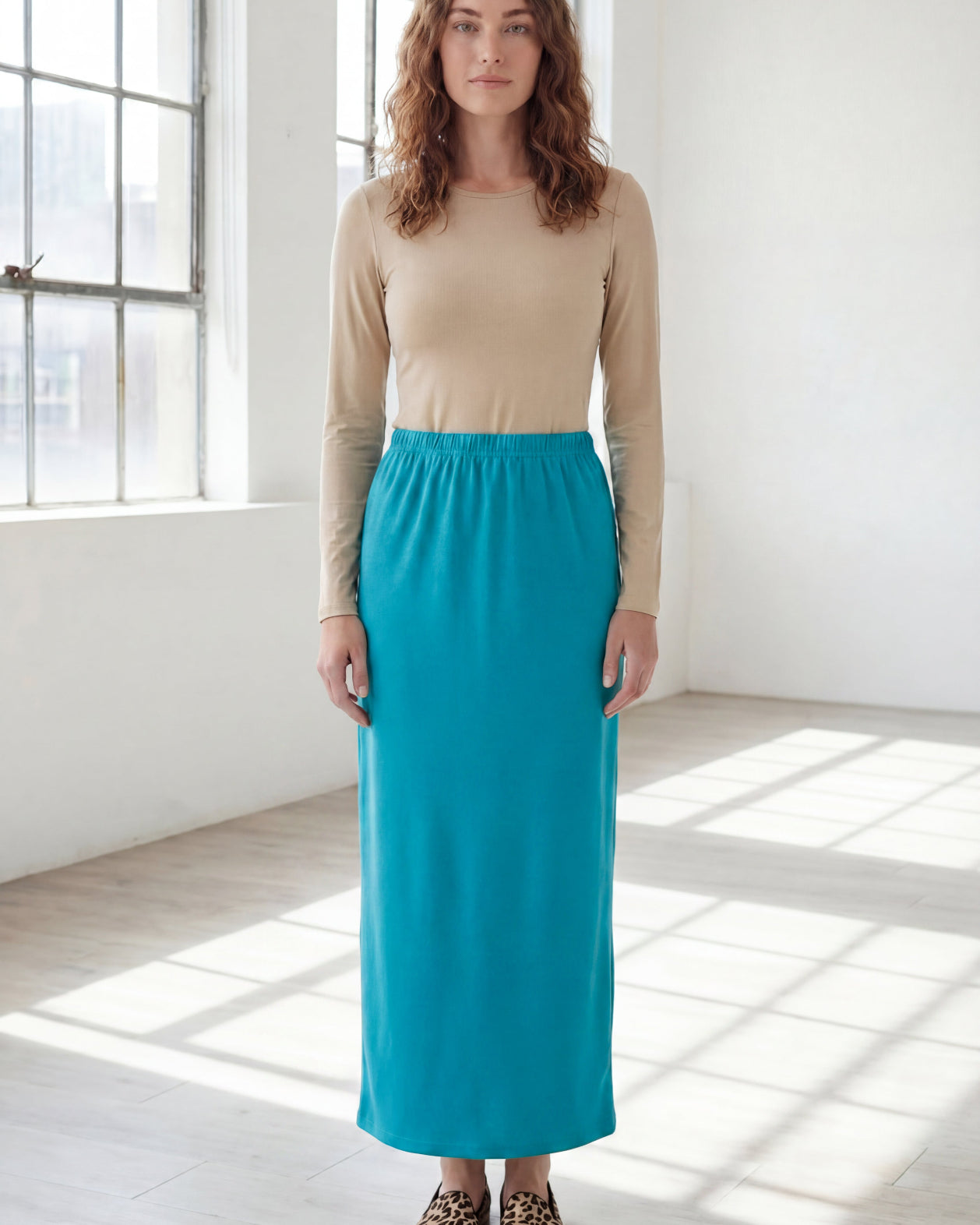 Model wearing Nuggles® 36" Classic Skirt in Teal