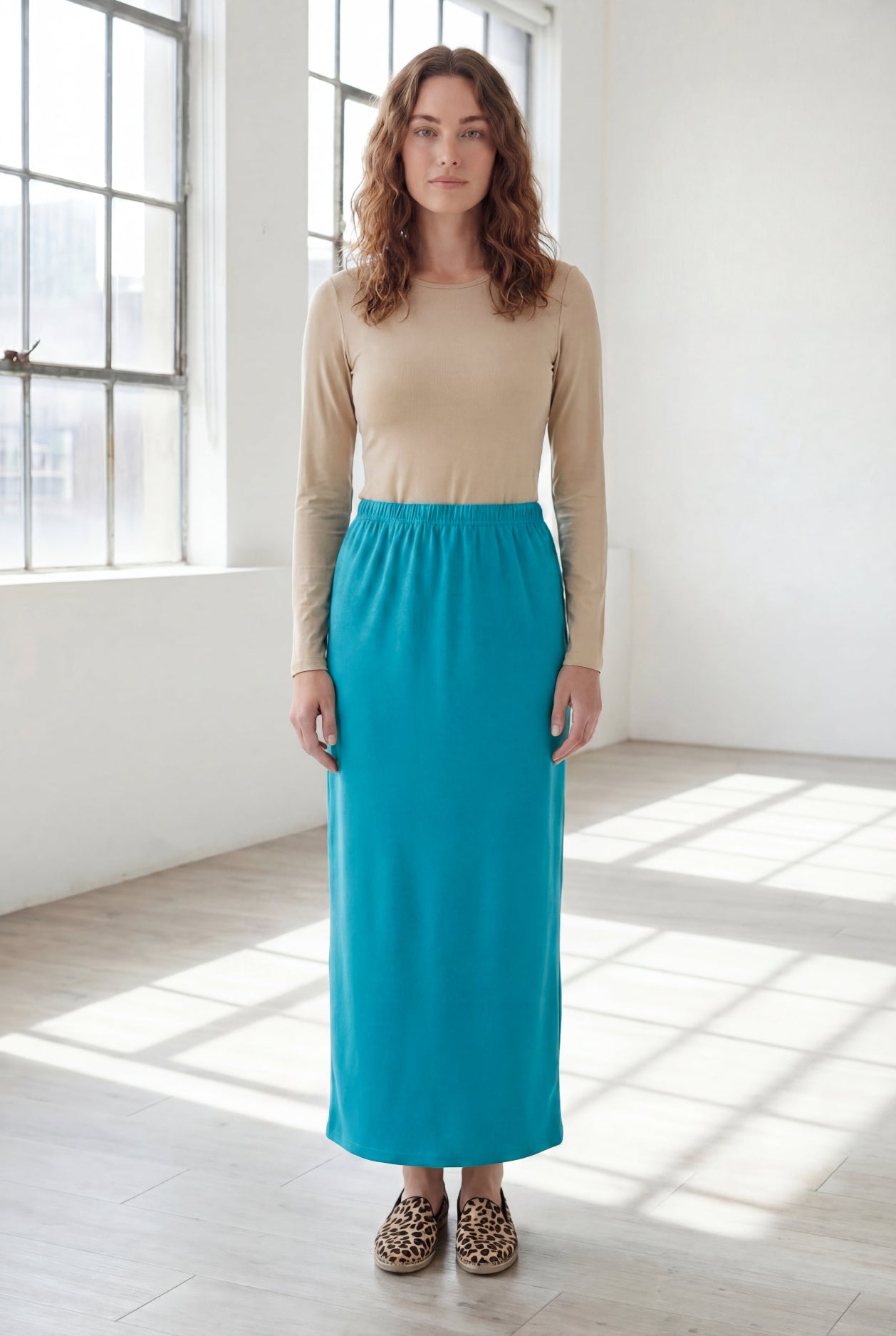 Model wearing Nuggles® 36" Classic Skirt in Teal