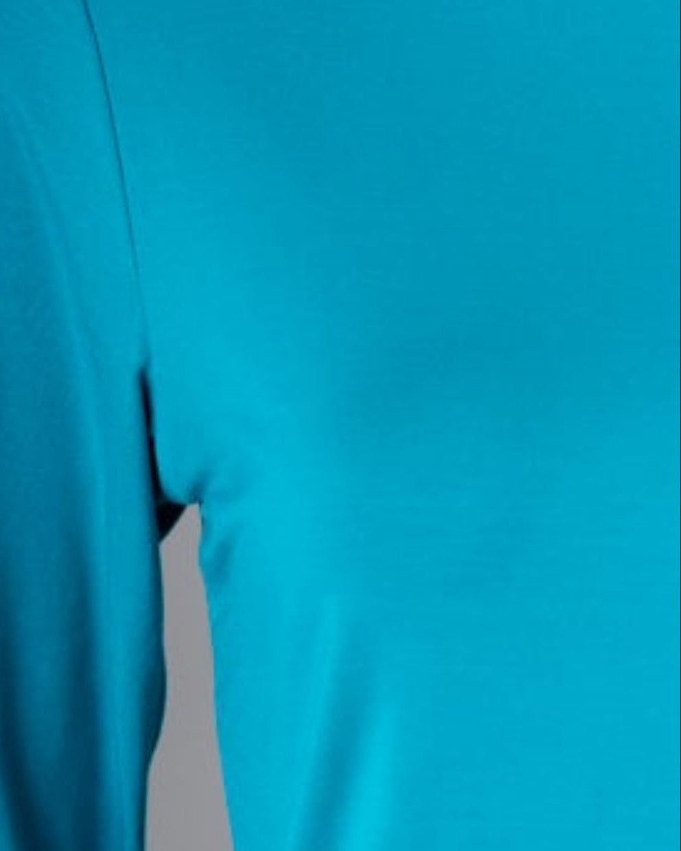 Model wearing Nuggles® 3/4 Essential Tee in Teal