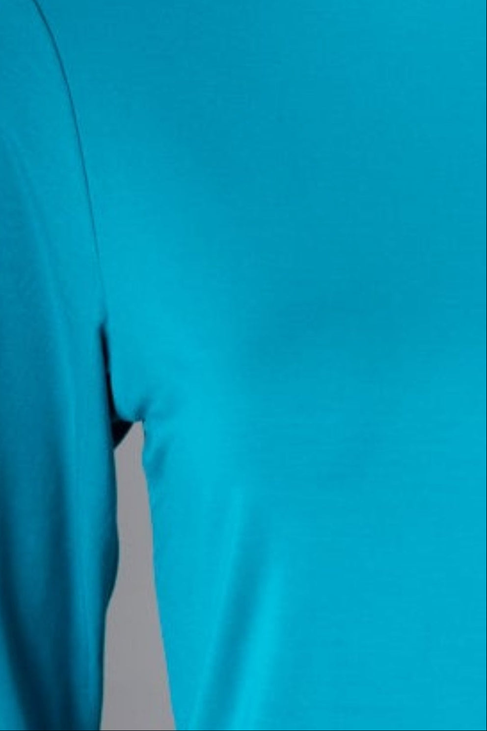 Model wearing Nuggles® 3/4 Essential Tee in Teal