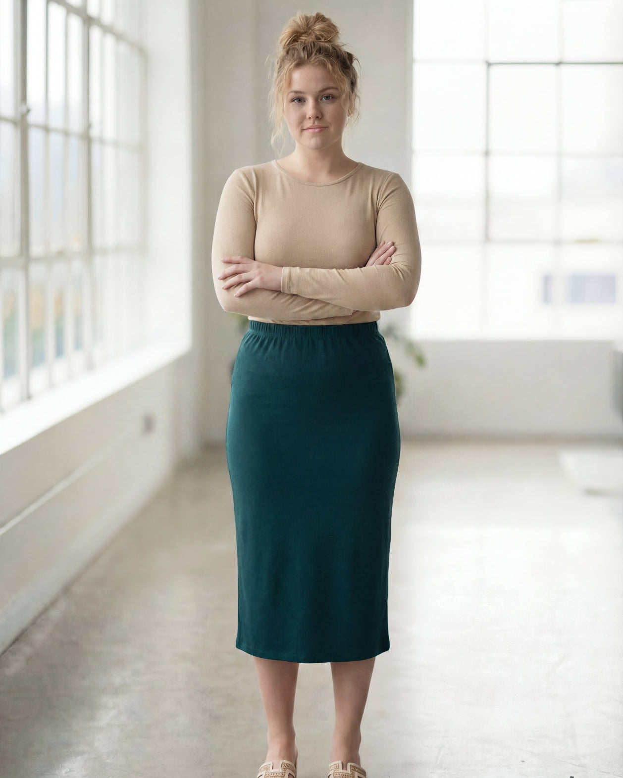 Model wearing Nuggles® 27" Classic Skirt in Teal Green