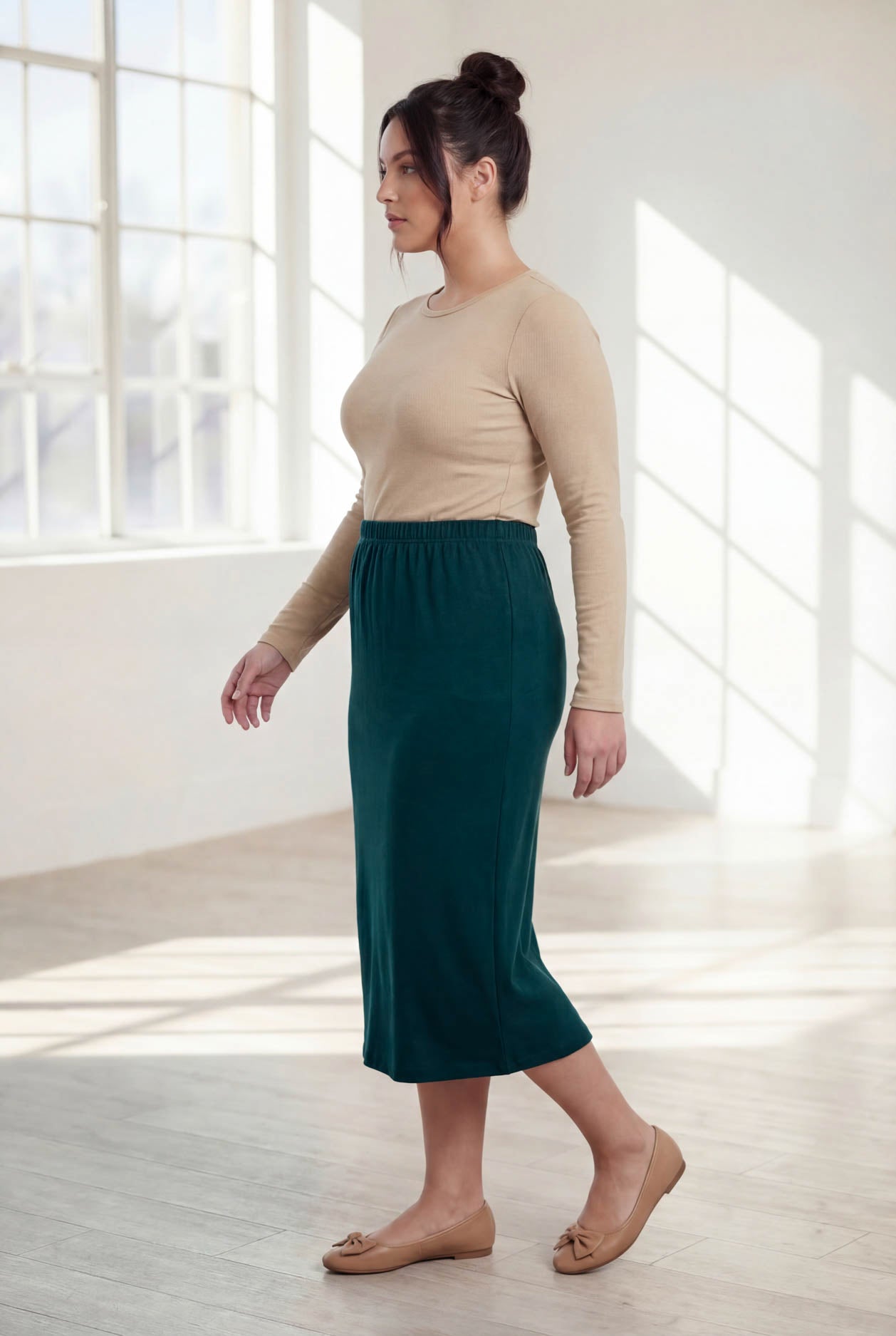 Model wearing Nuggles® 31" Classic Skirt in Teal Green