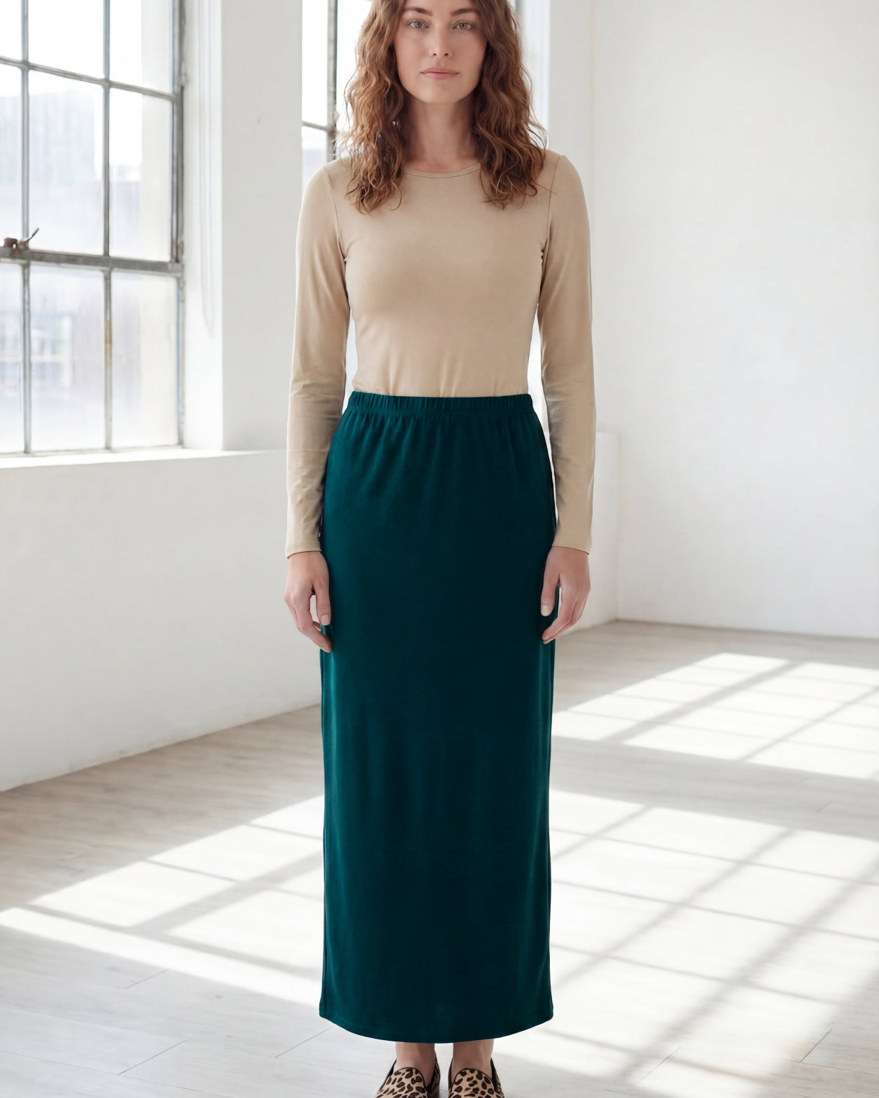 Model wearing Nuggles® 36" Classic Skirt in Teal Green