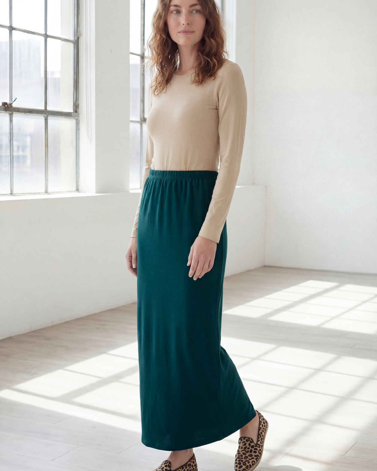 Model wearing Nuggles® 36" Classic Skirt in Teal Green