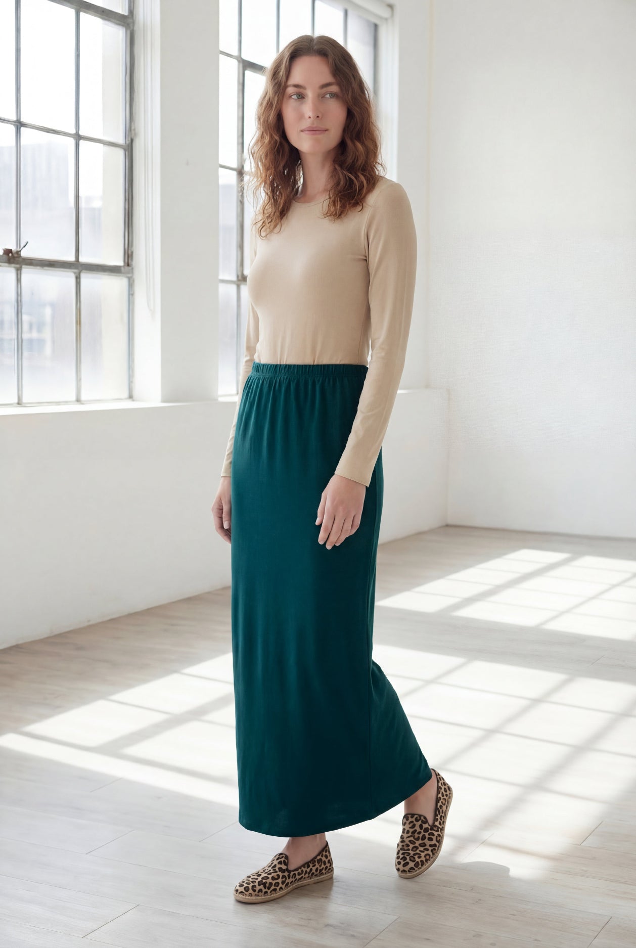 Model wearing Nuggles® 36" Classic Skirt in Teal Green