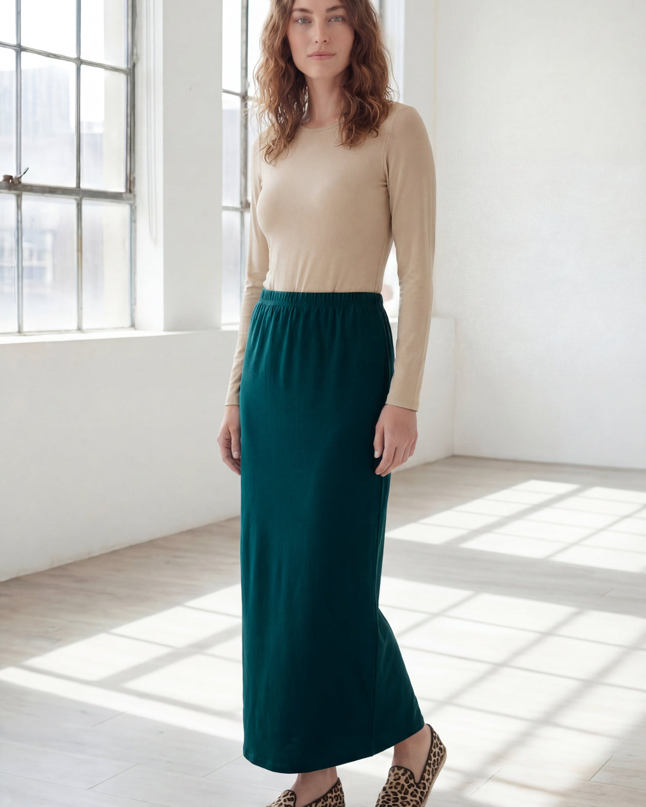 Model wearing Nuggles® 36" Classic Skirt in Teal Green