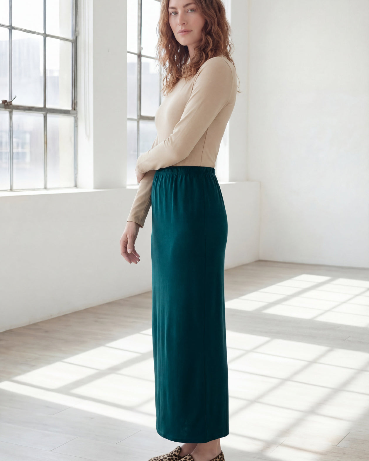 Model wearing Nuggles® 36" Classic Skirt in Teal Green