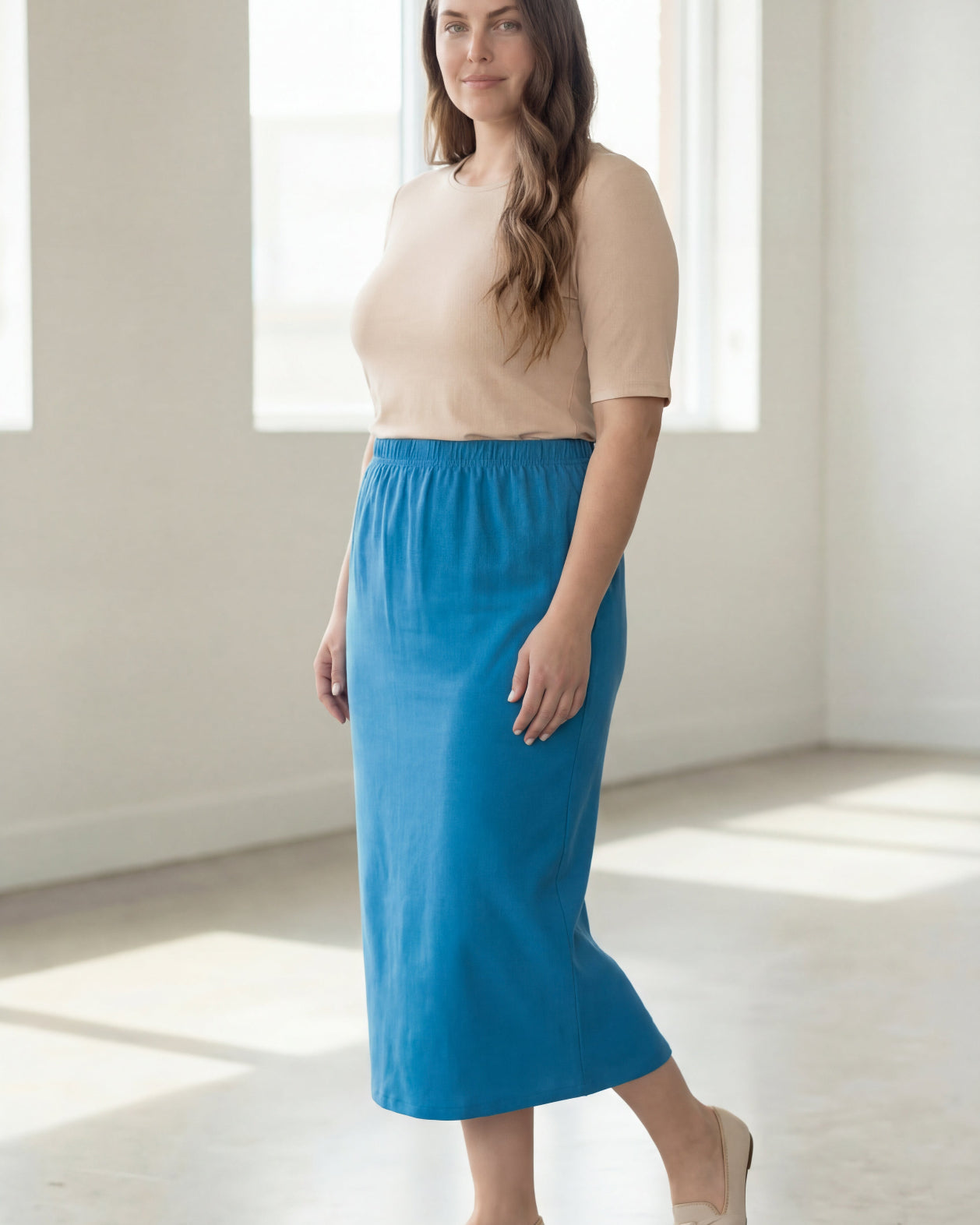 Model wearing Nuggles® 34" Classic Skirt in Turquoise