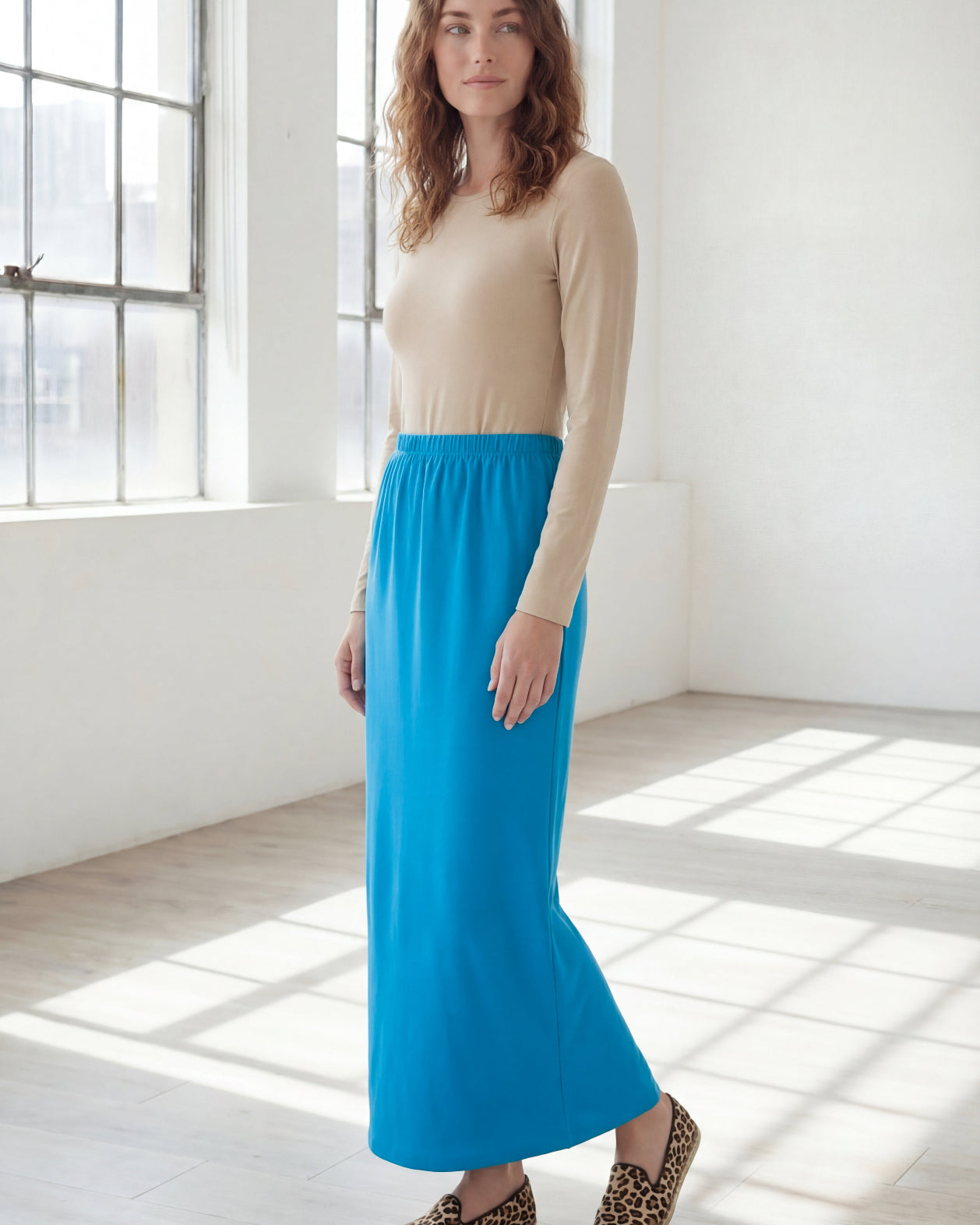 Model wearing Nuggles® 36" Classic Skirt in Turquoise