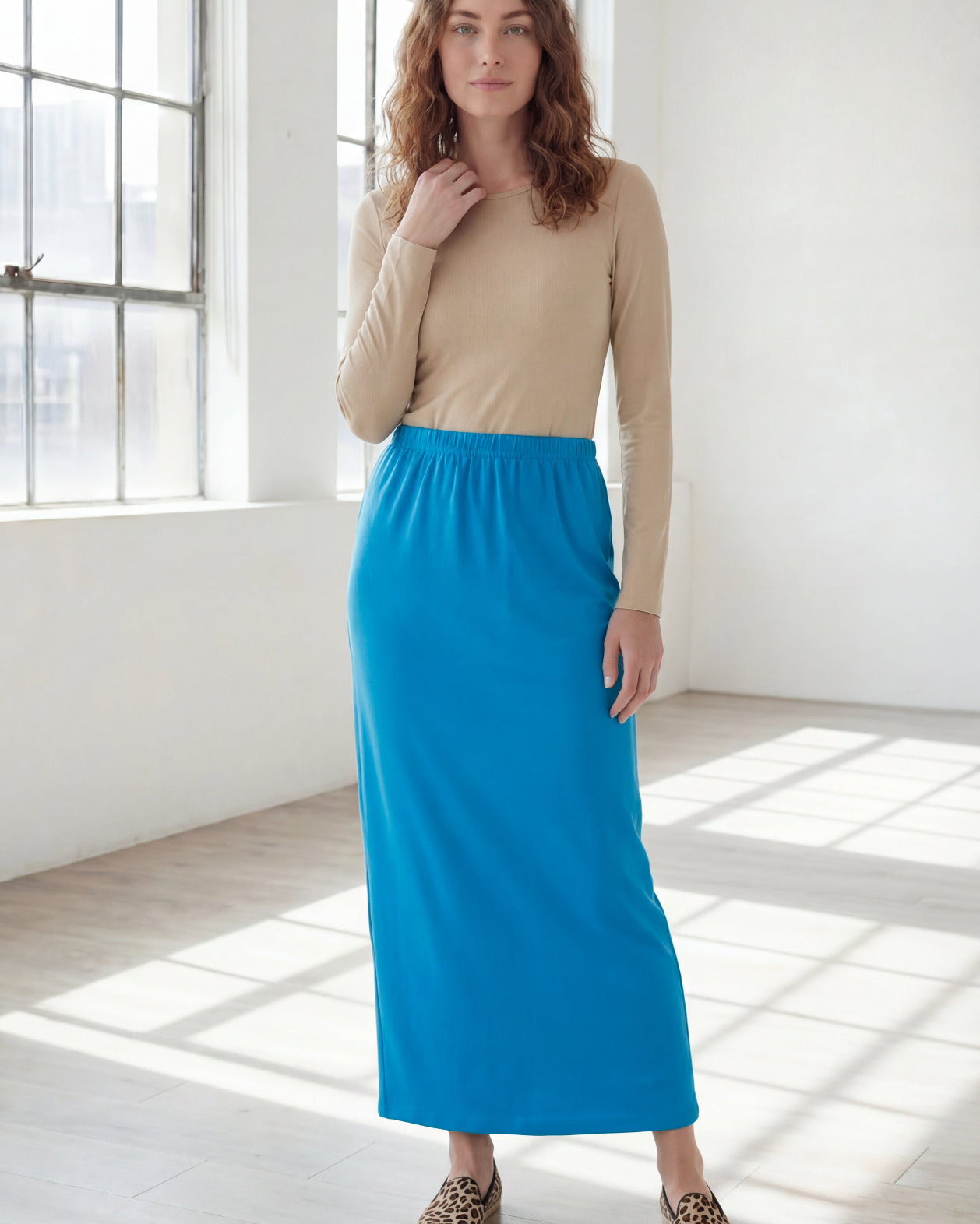 Model wearing Nuggles® 36" Classic Skirt in Turquoise