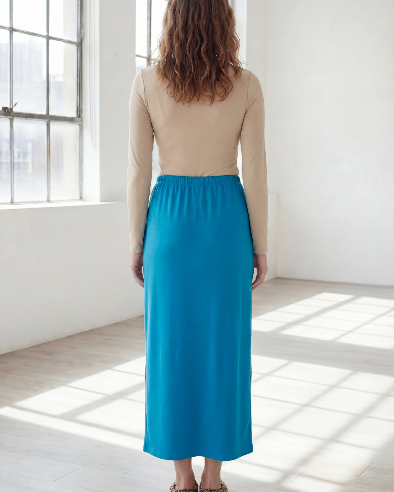 Model wearing Nuggles® 36" Classic Skirt in Turquoise
