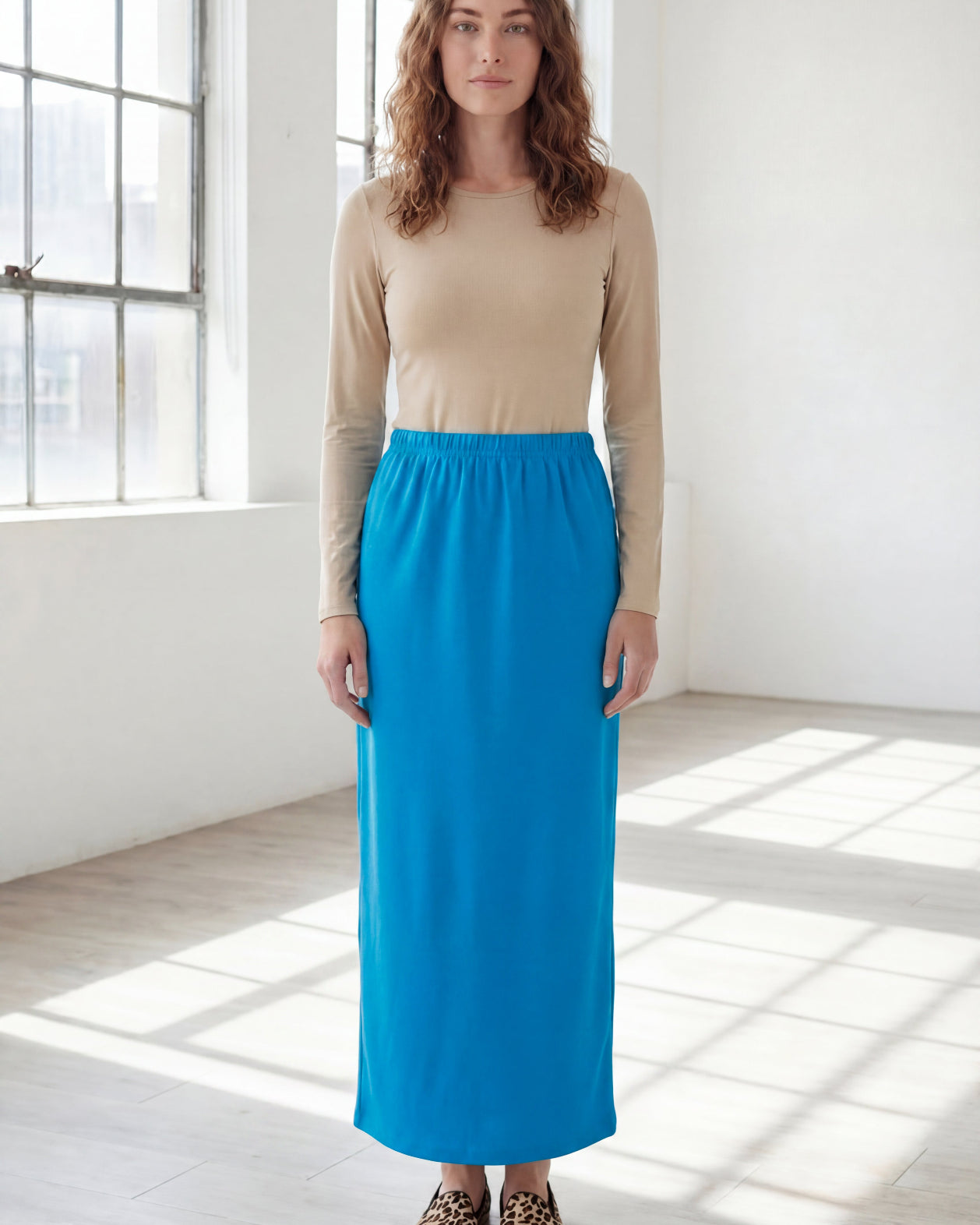 Model wearing Nuggles® 36" Classic Skirt in Turquoise