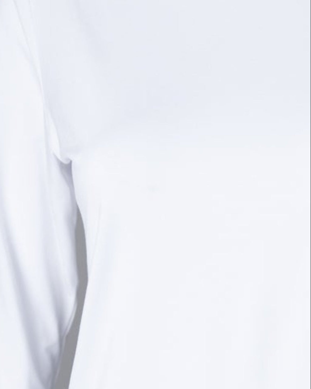 Model wearing Nuggles® 3/4 Essential Tee in White