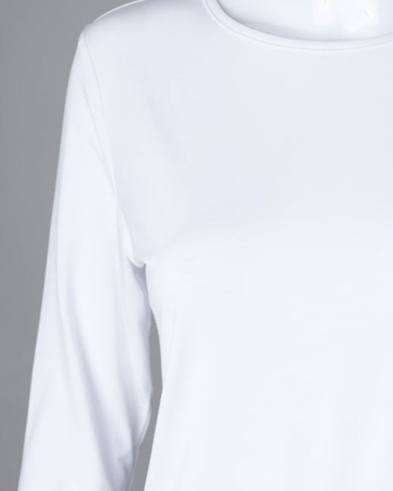 Model wearing Nuggles® 3/4 Essential Tee in White