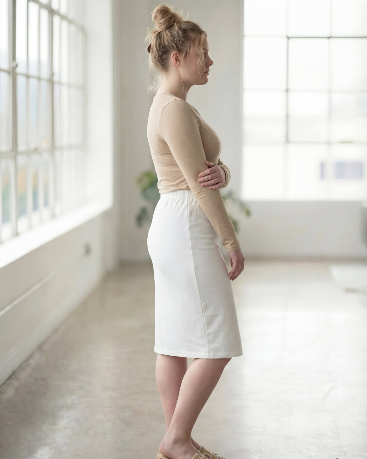 Model wearing Nuggles® 27" Classic Skirt in White