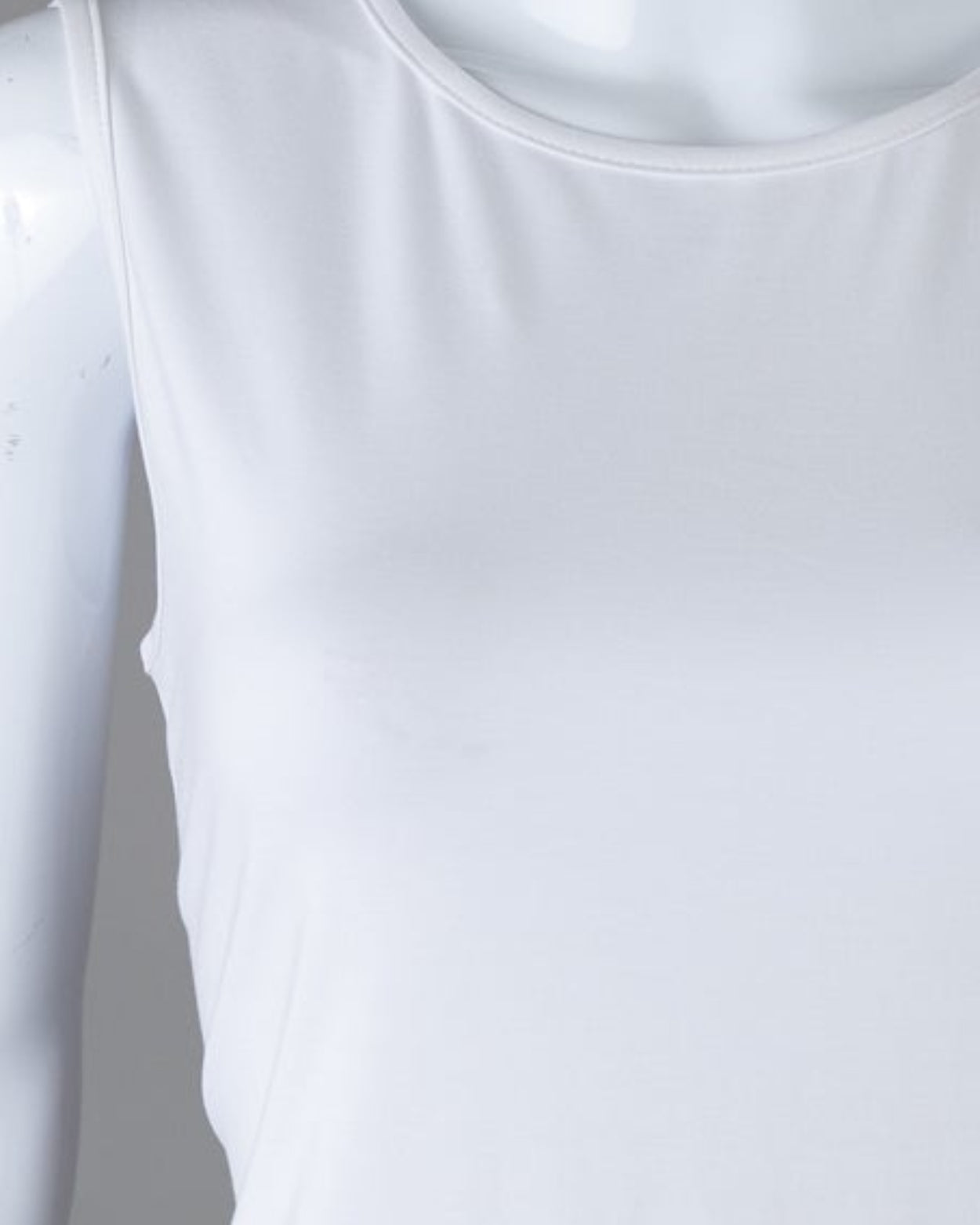 Model wearing Nuggles® Essential Tank in White