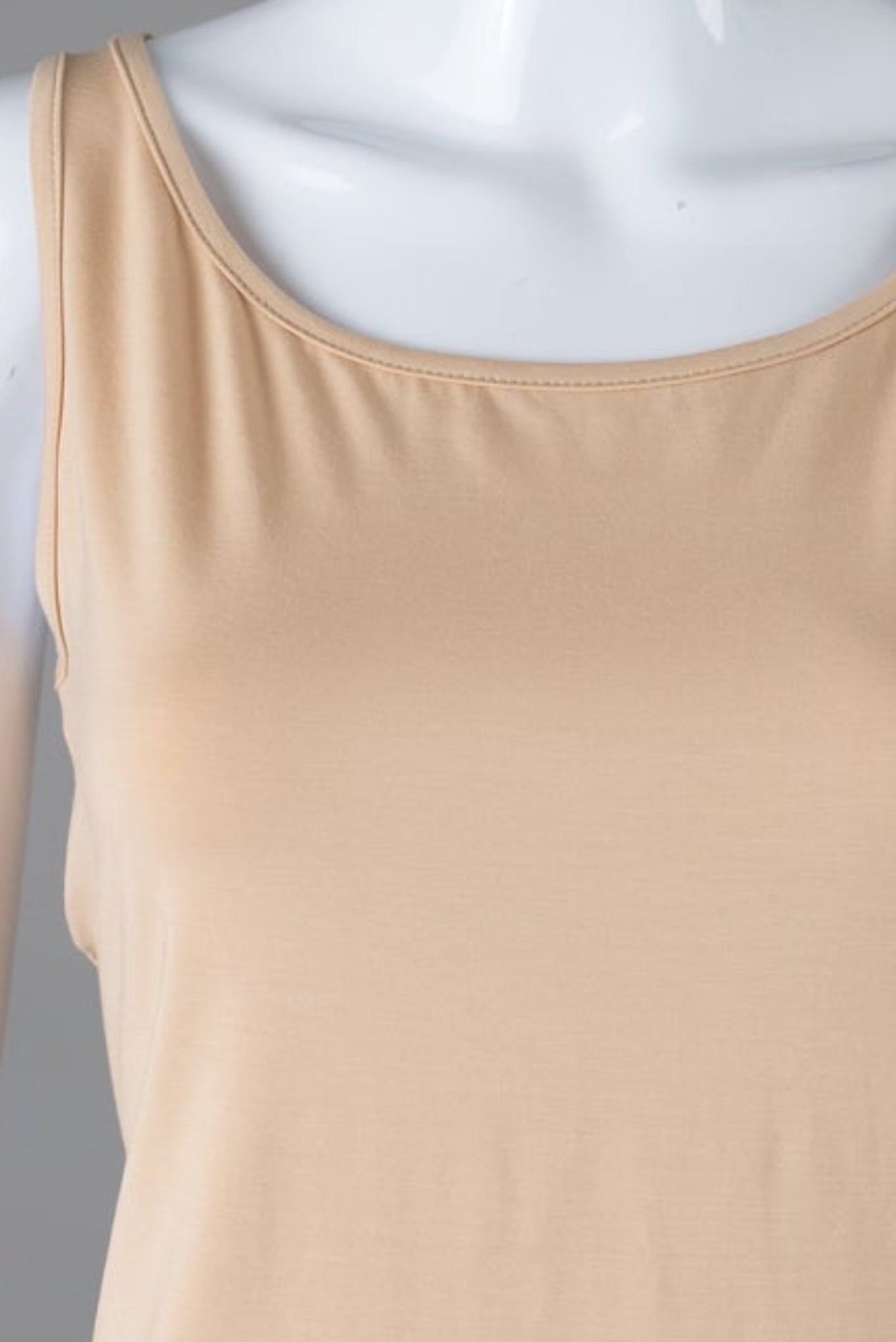 Model wearing Nuggles® Wide Neck Tank in Buff