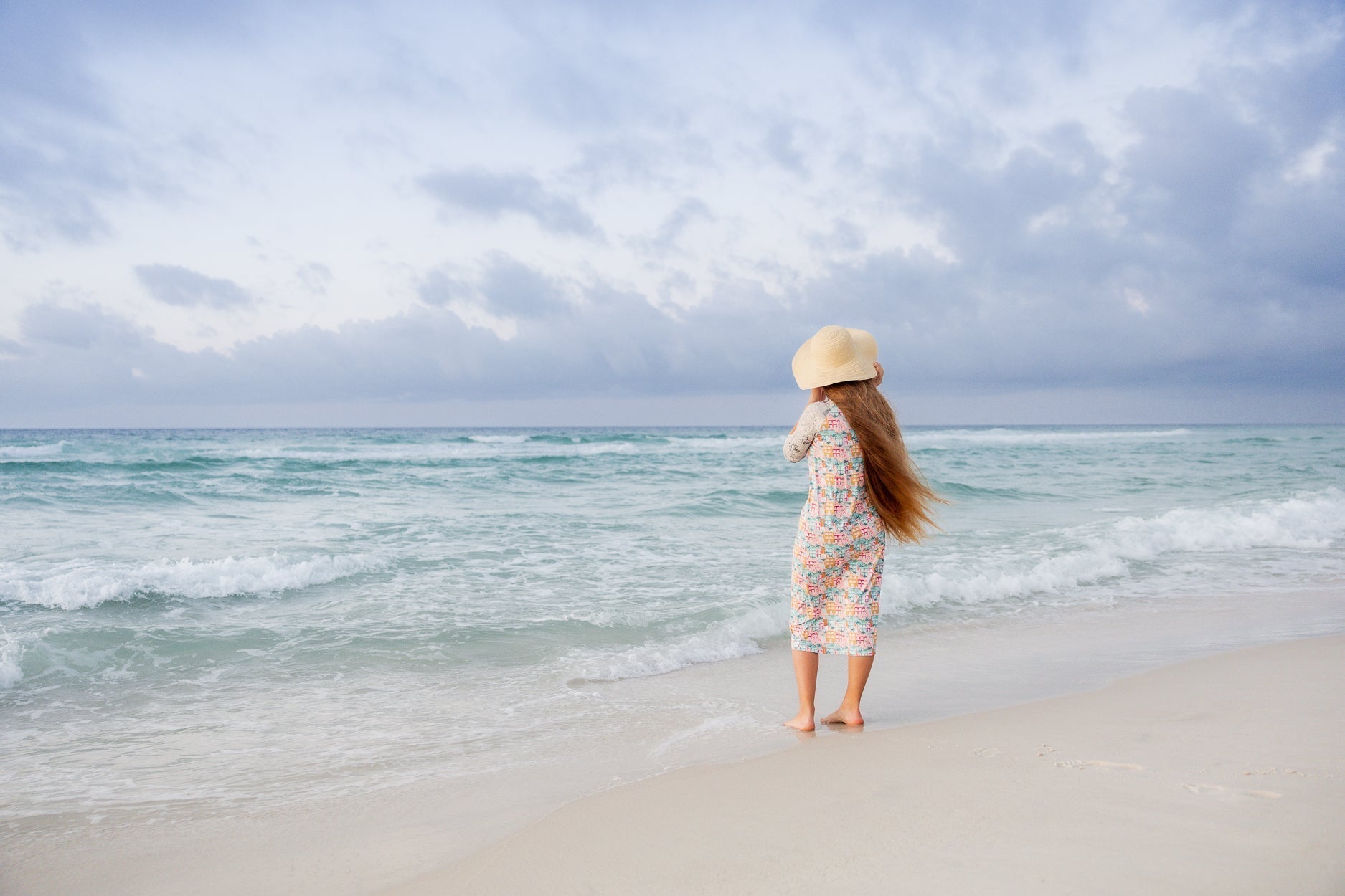 A modest swim wear dress with 3/4 sleeves and midi length. 