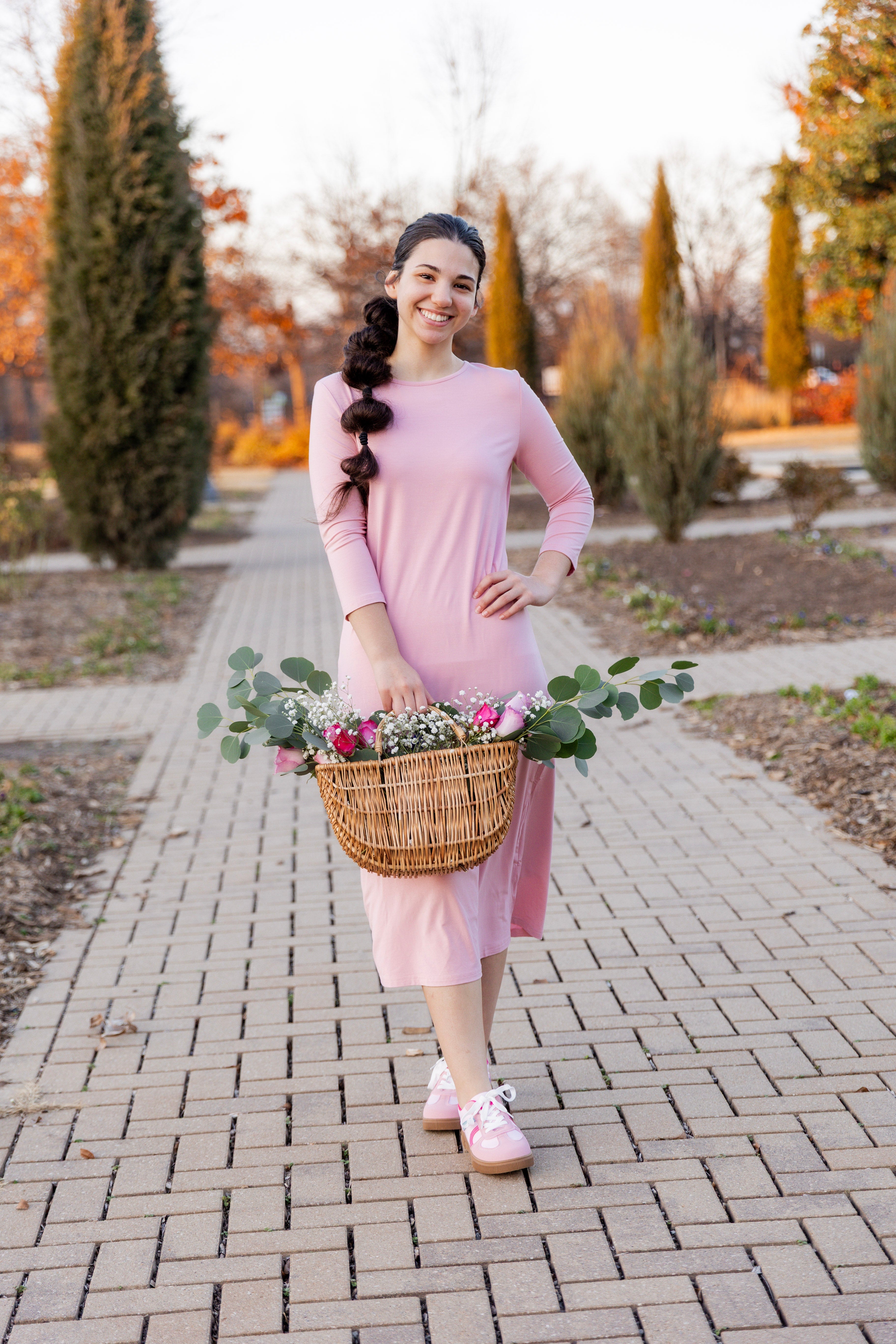 Women wearing a modest layering dress from Nuggles® in Green.