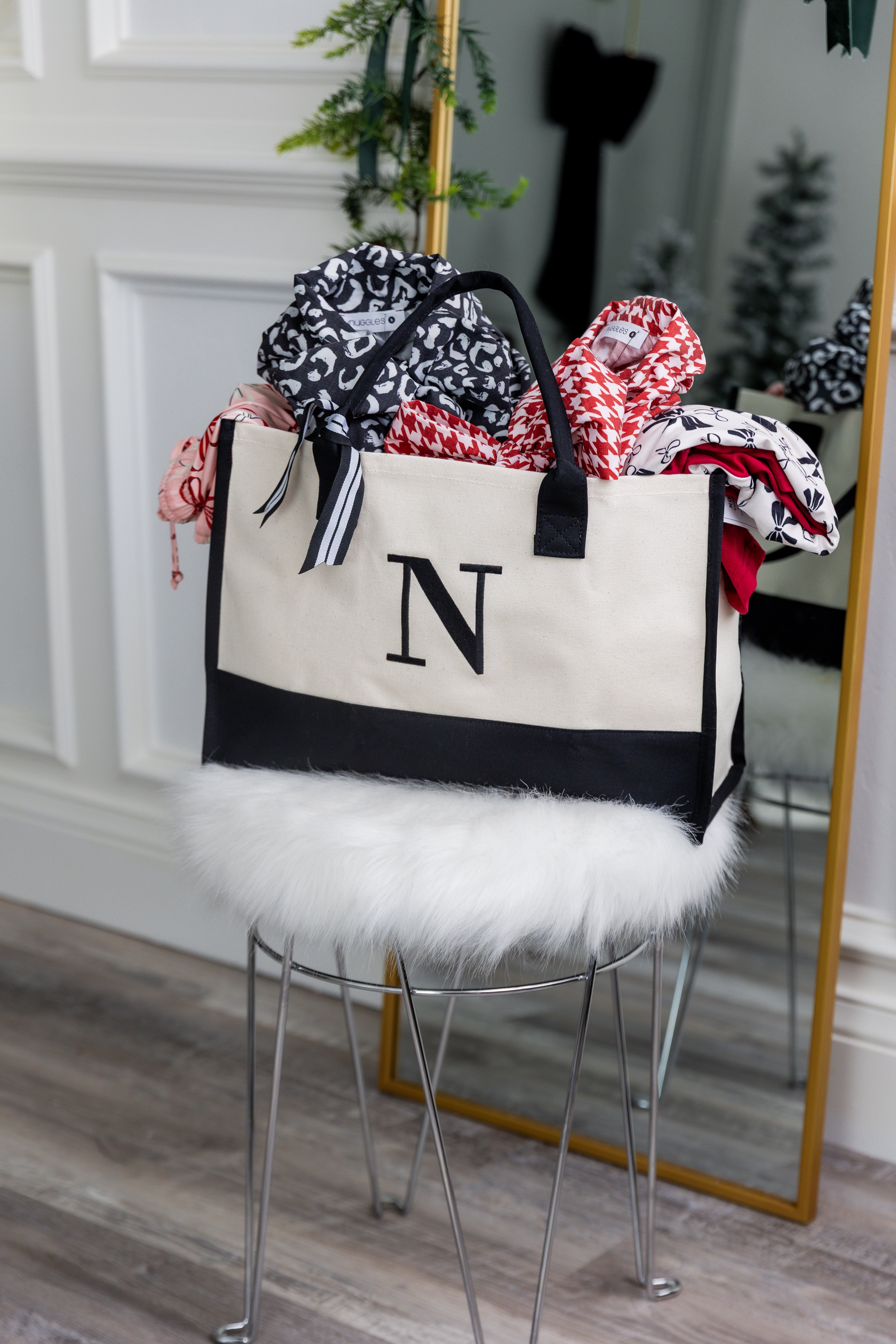 Modest Clothing from Nuggles® at clearance prices. Picture features some of our products inside a Nuggles bag.