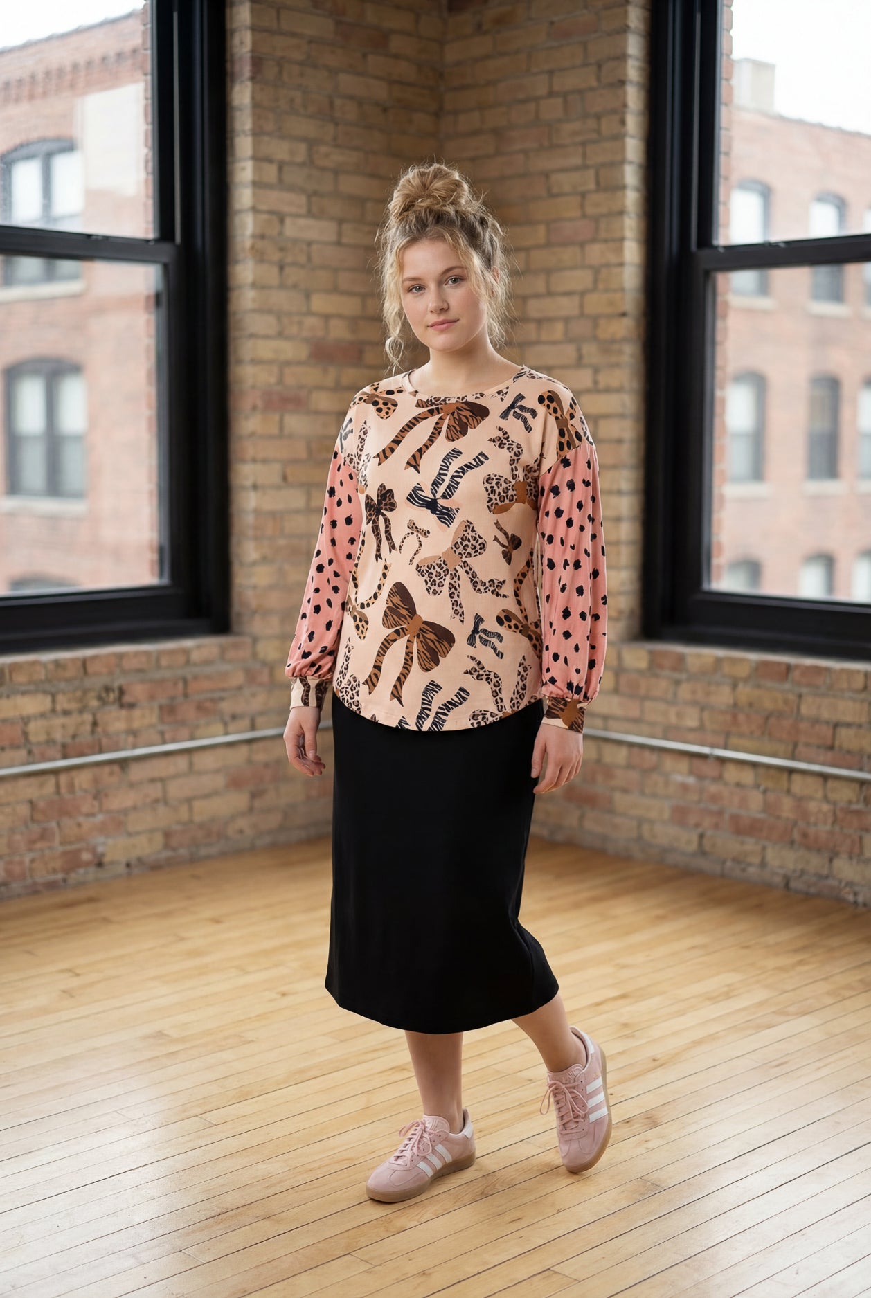Model wearing Nuggles® Bryauna Top in Love & Leopard