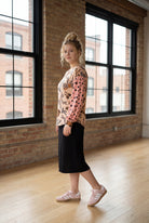 Model wearing the Nuggles® Bryauna Top in Love & Leopard