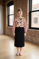 Model wearing the Nuggles® Bryauna Top in Love & Leopard