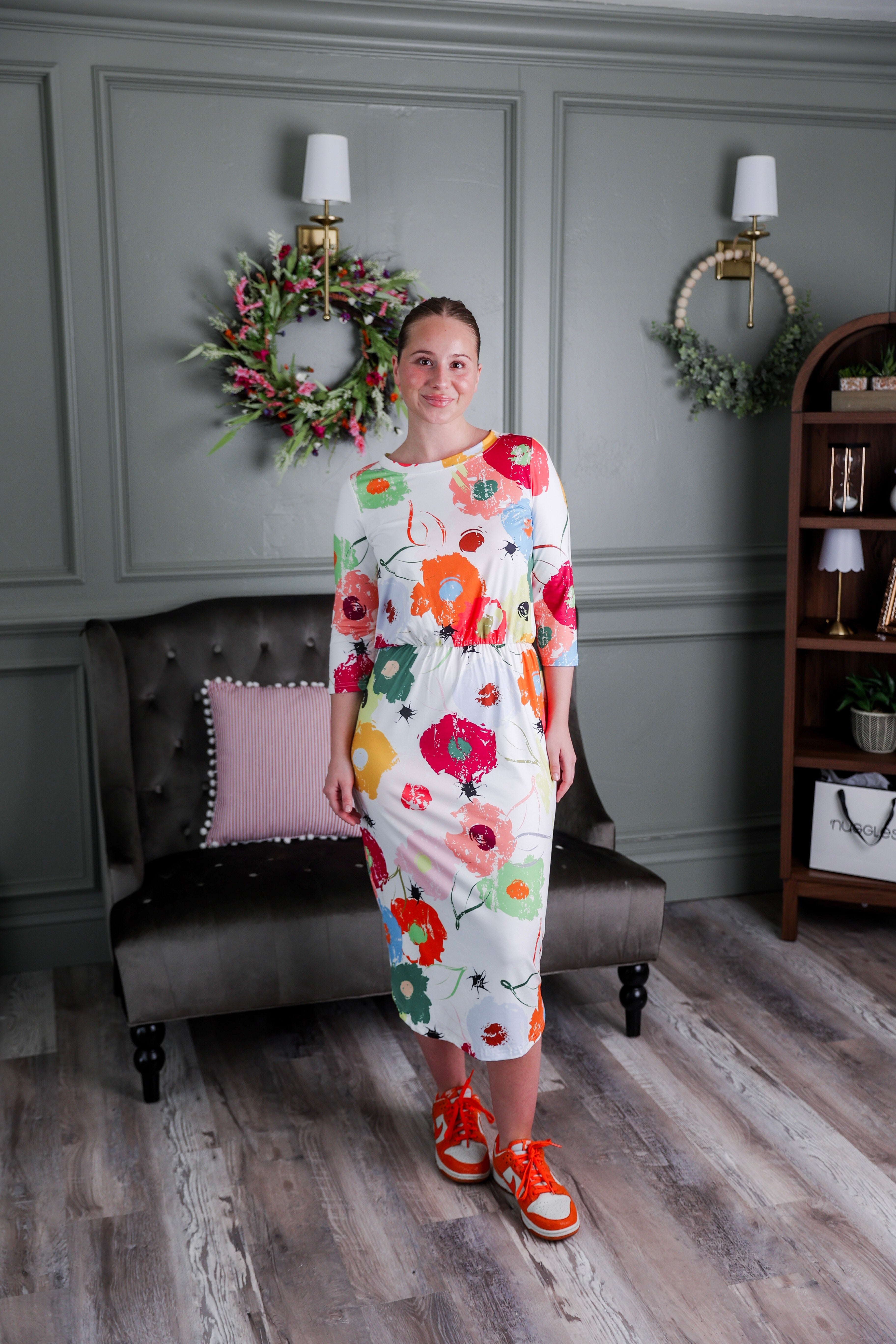 Model wearing Modest Nuggles® Harper Jane Dress in Party Blooms