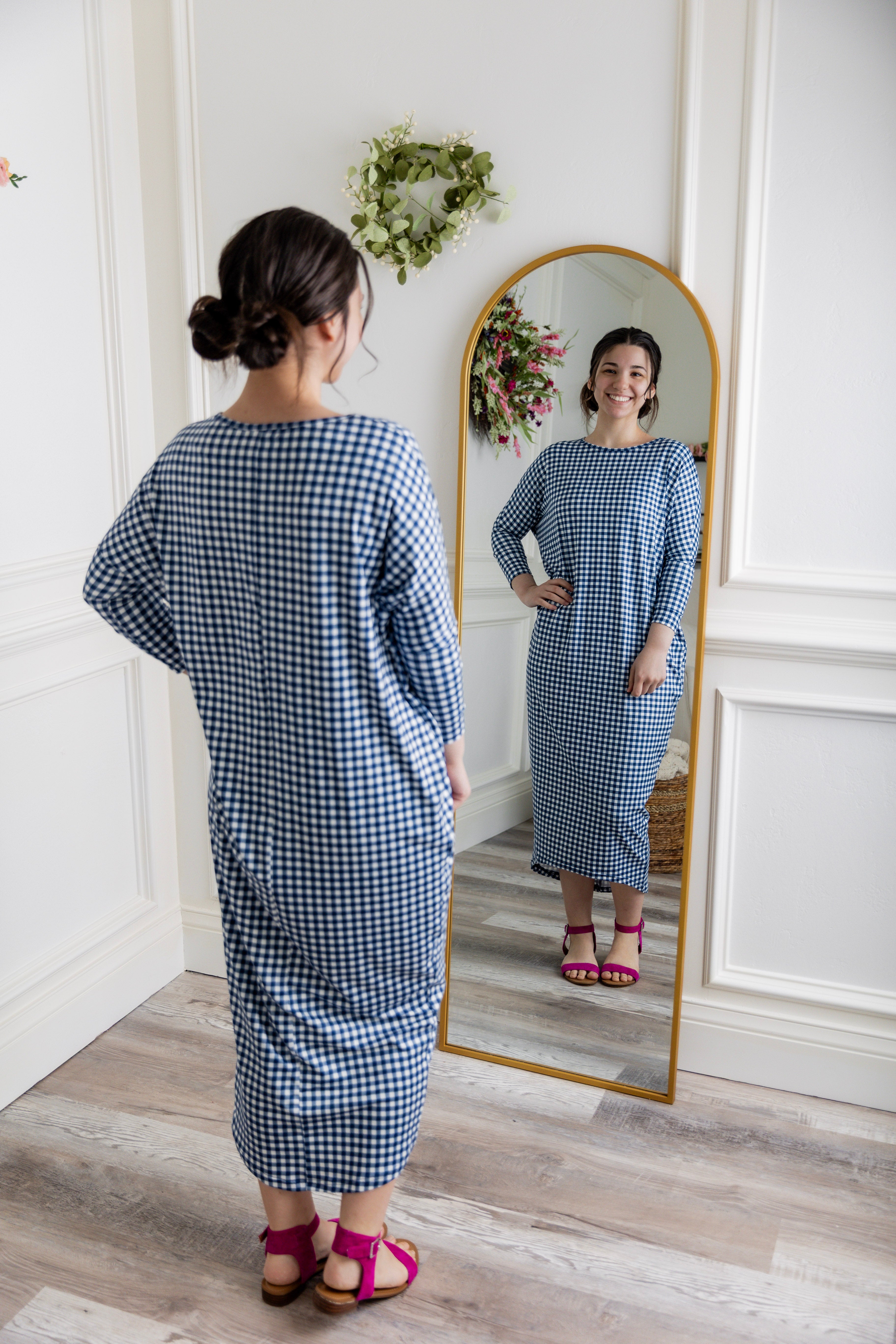 Modest dolman sleeve dress for women with relaxed fit and tapered hem, made from soft stretch knit fabric – perfect for everyday wear.