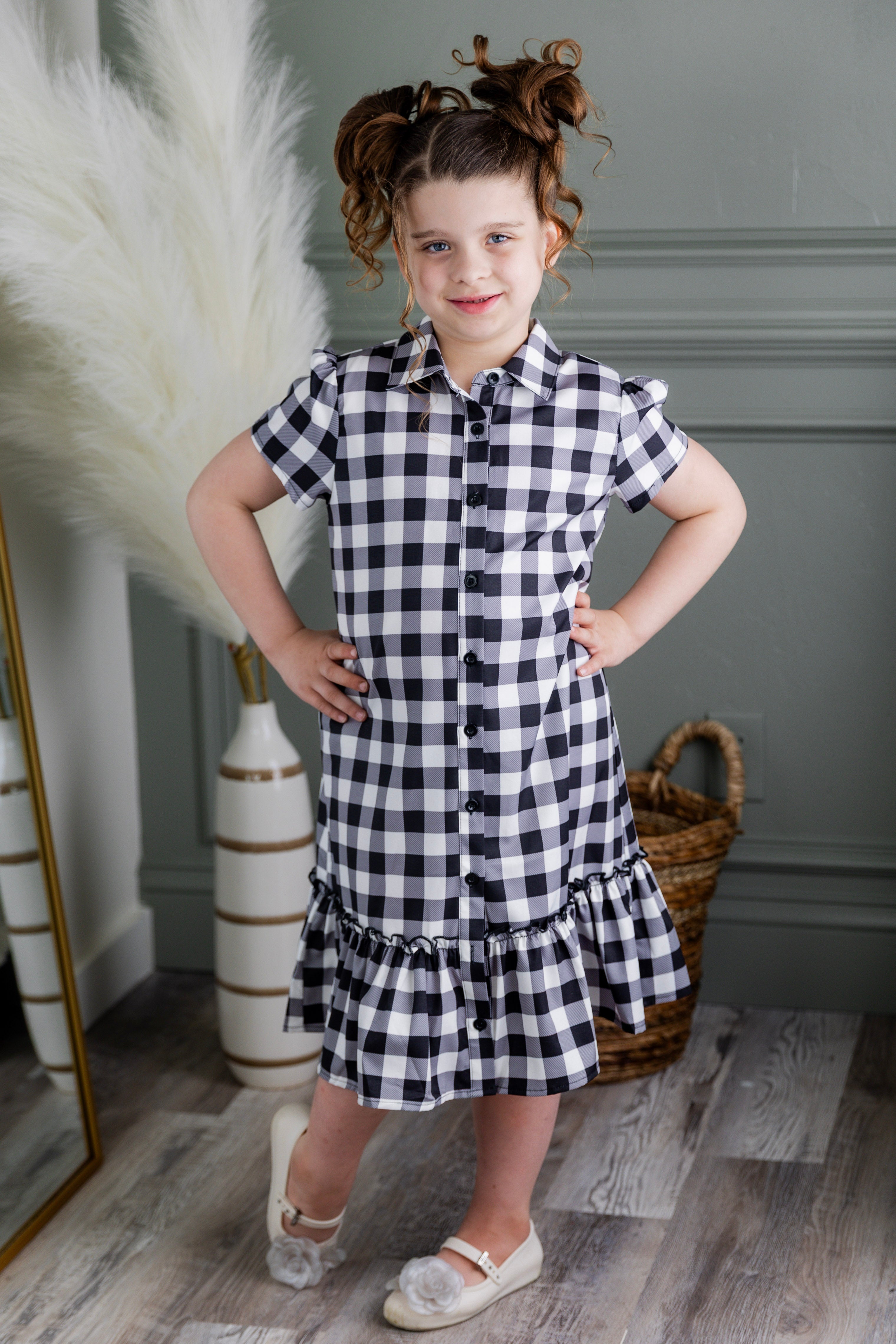 Model wearing Nuggles® Girls' Ellie Dress Dress in Storybook Check