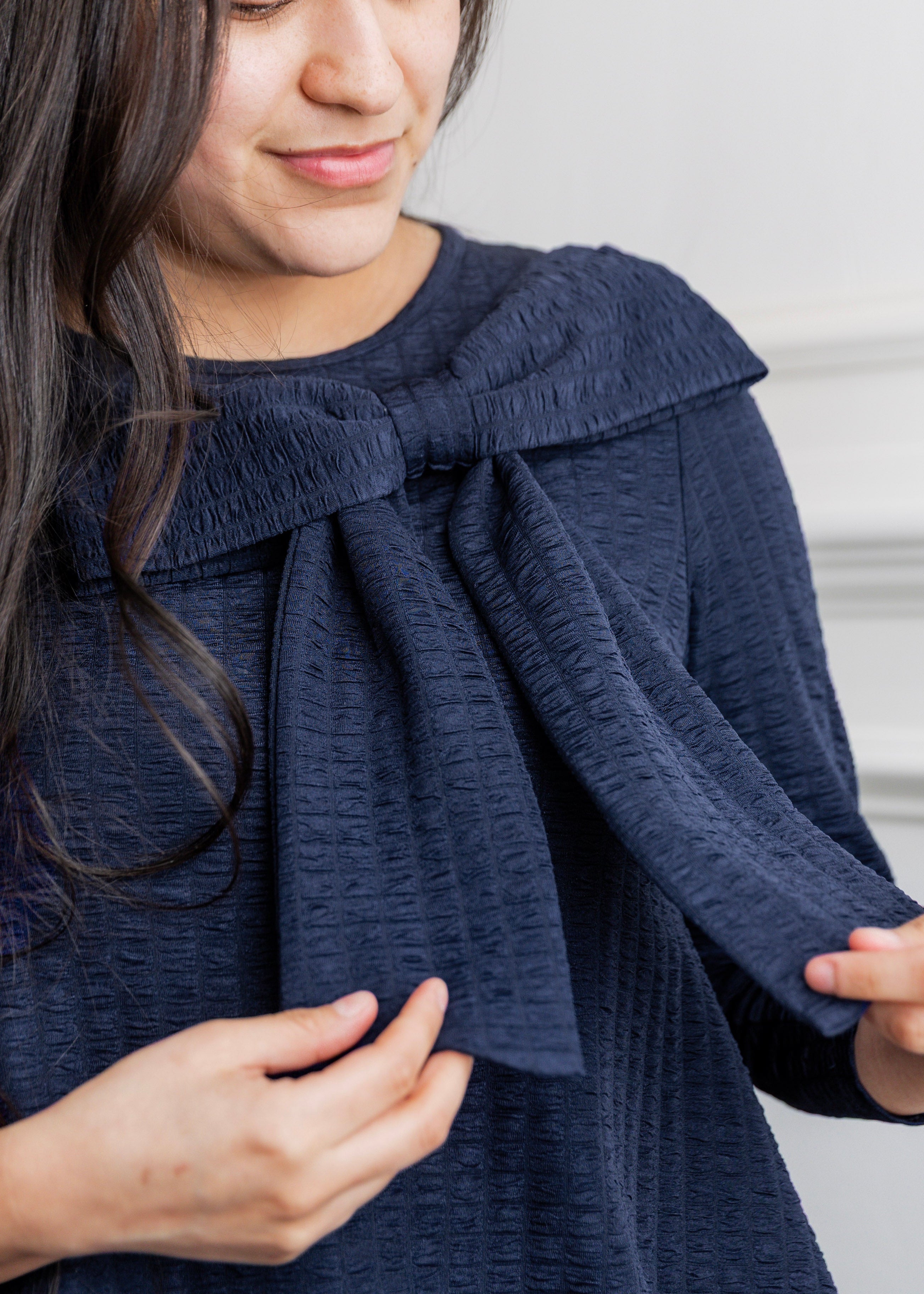 Model wearing Nuggles® Eleanor Top in Navy