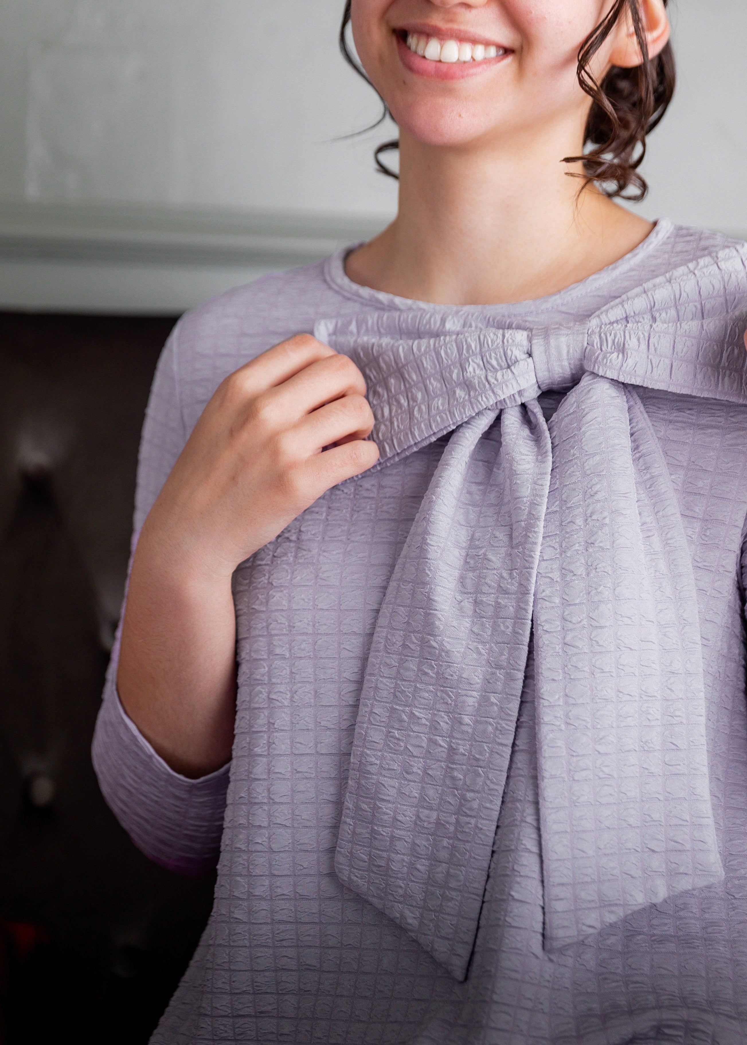 Model wearing Nuggles® Eleanor Top in Lilac