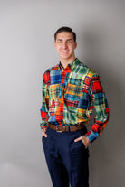 Model wearing Nuggles® Men's Button Down Shirt in Patch Plaid