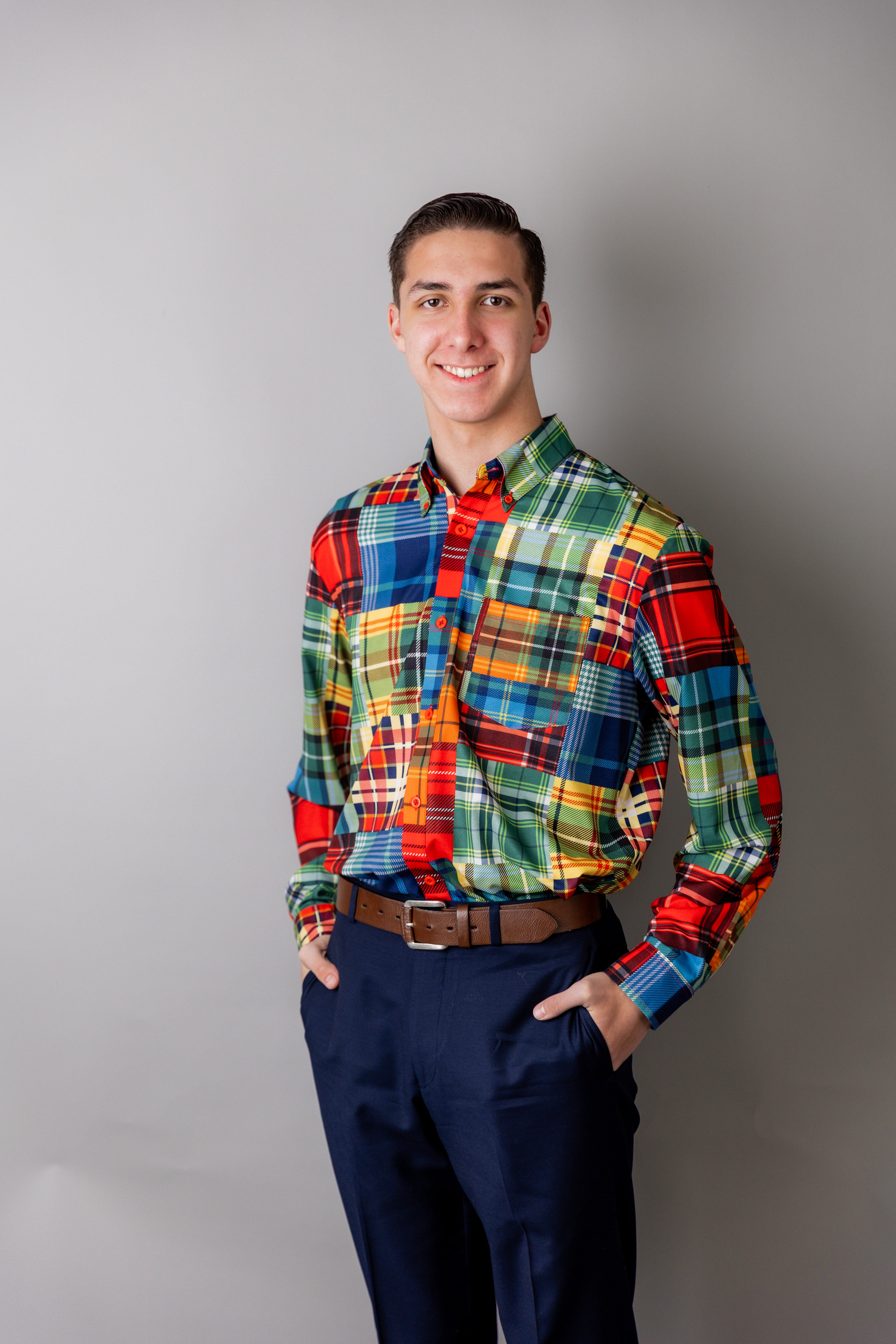 Model wearing Nuggles® Men's Button Down Shirt in Patch Plaid