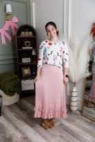 Model wearing Nuggles® Callie Skirt in Baby Pink Modest skirt