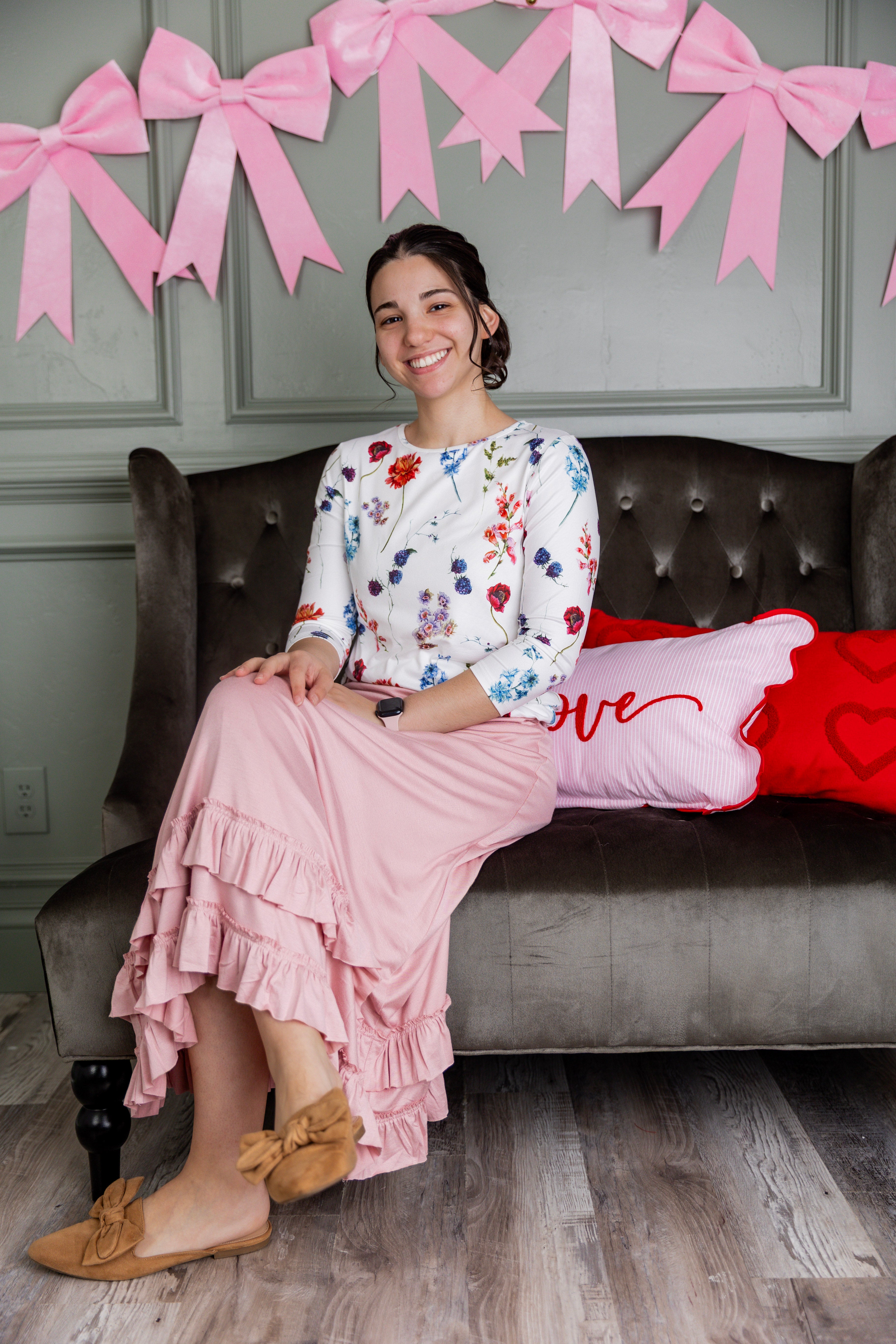 Model wearing Nuggles® Callie Skirt in Baby Pink Modest skirt