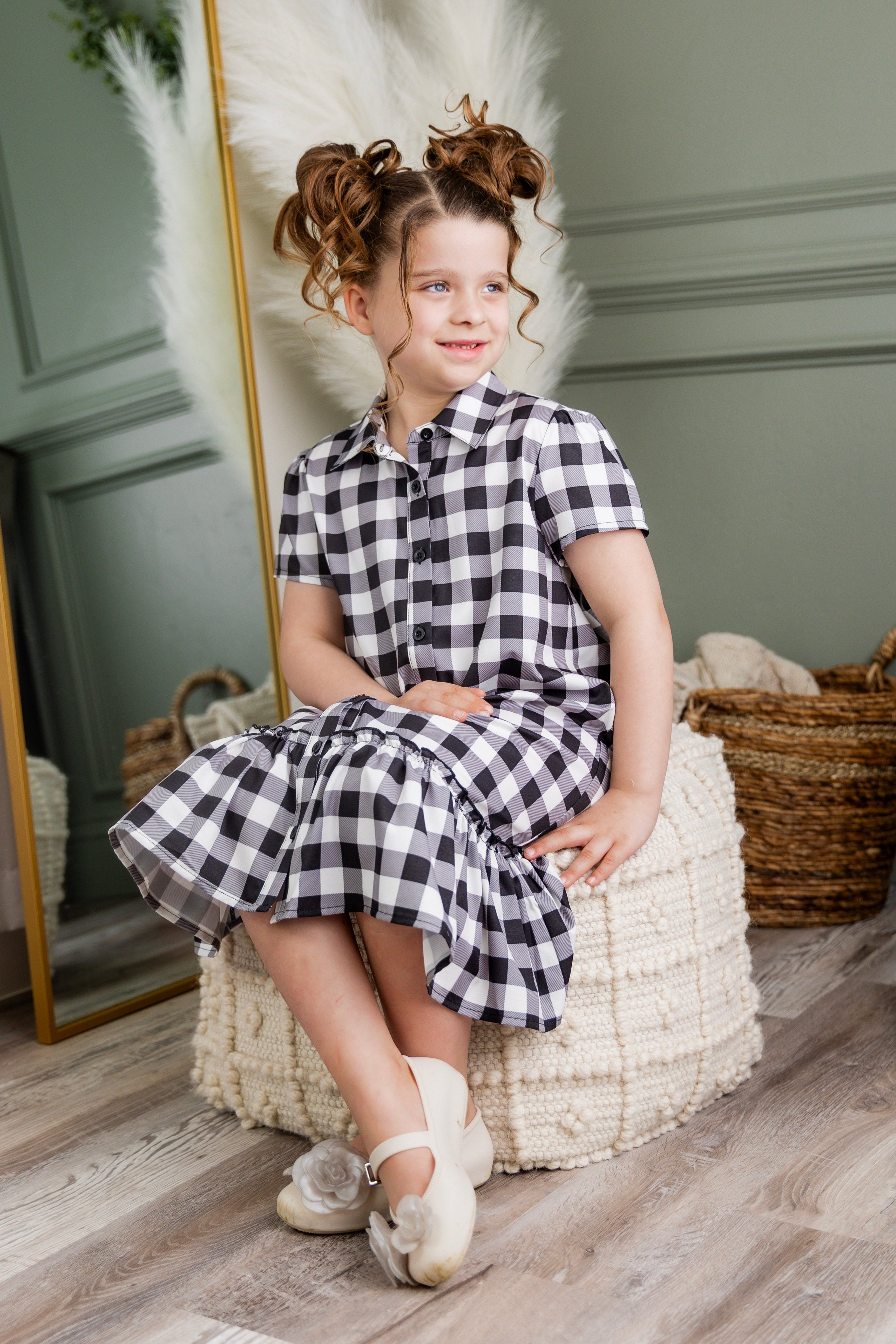 Model wearing Nuggles® Girls' Ellie Dress Dress in Storybook Check