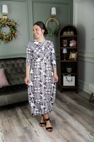Model wearing Nuggles®  Cindy Bubble Dress in Midtown Plaid 