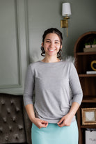 Model wearing out Nuggles® Essential 3/4 sleeve tee.