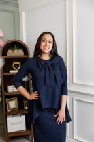 Model wearing Nuggles® 31' Eleanor Skirt in Navy