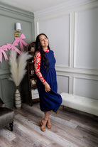 Model wearing Nuggles® Mesh Tee top in Rosie Rouge