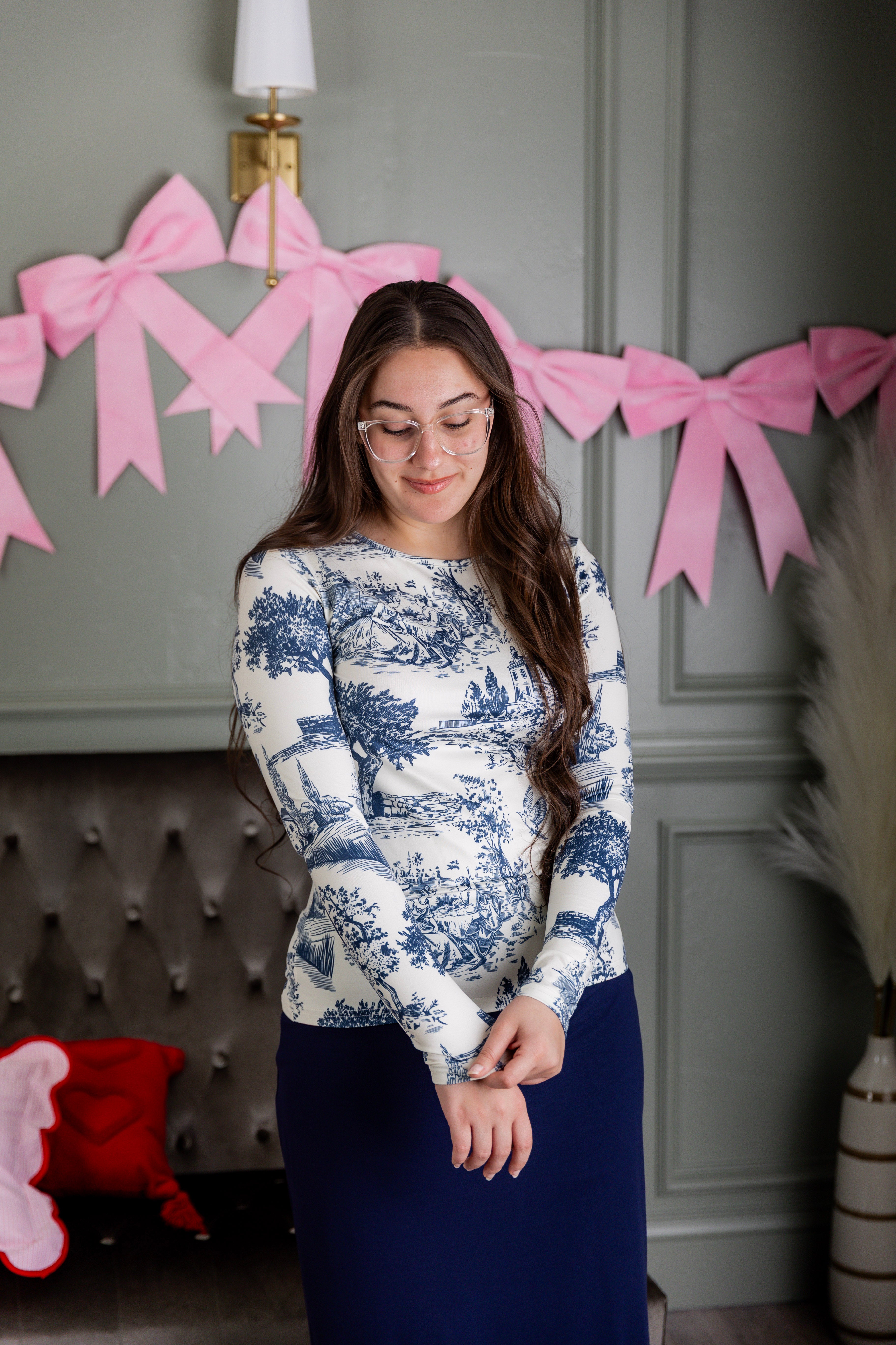 Model wearing Nuggles® Essential Long Sleeve Tee in Storybook Stroll