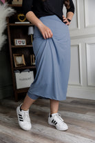 Model wearing Nuggles® 31" All-Sport Skirt in Baby Blue