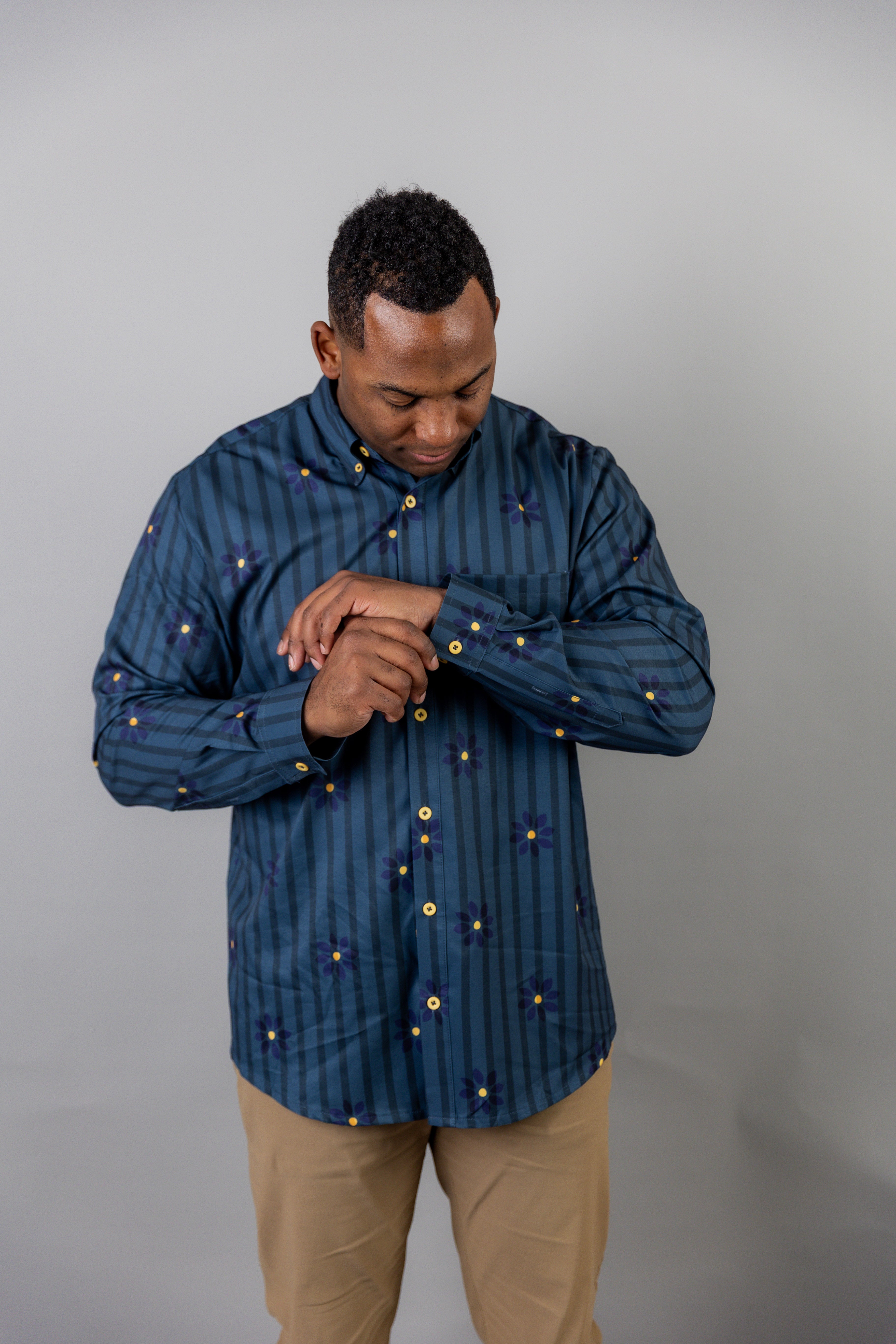 Model wearing Nuggles® Men's Button Down Shirt in Pinstripe Ditsy