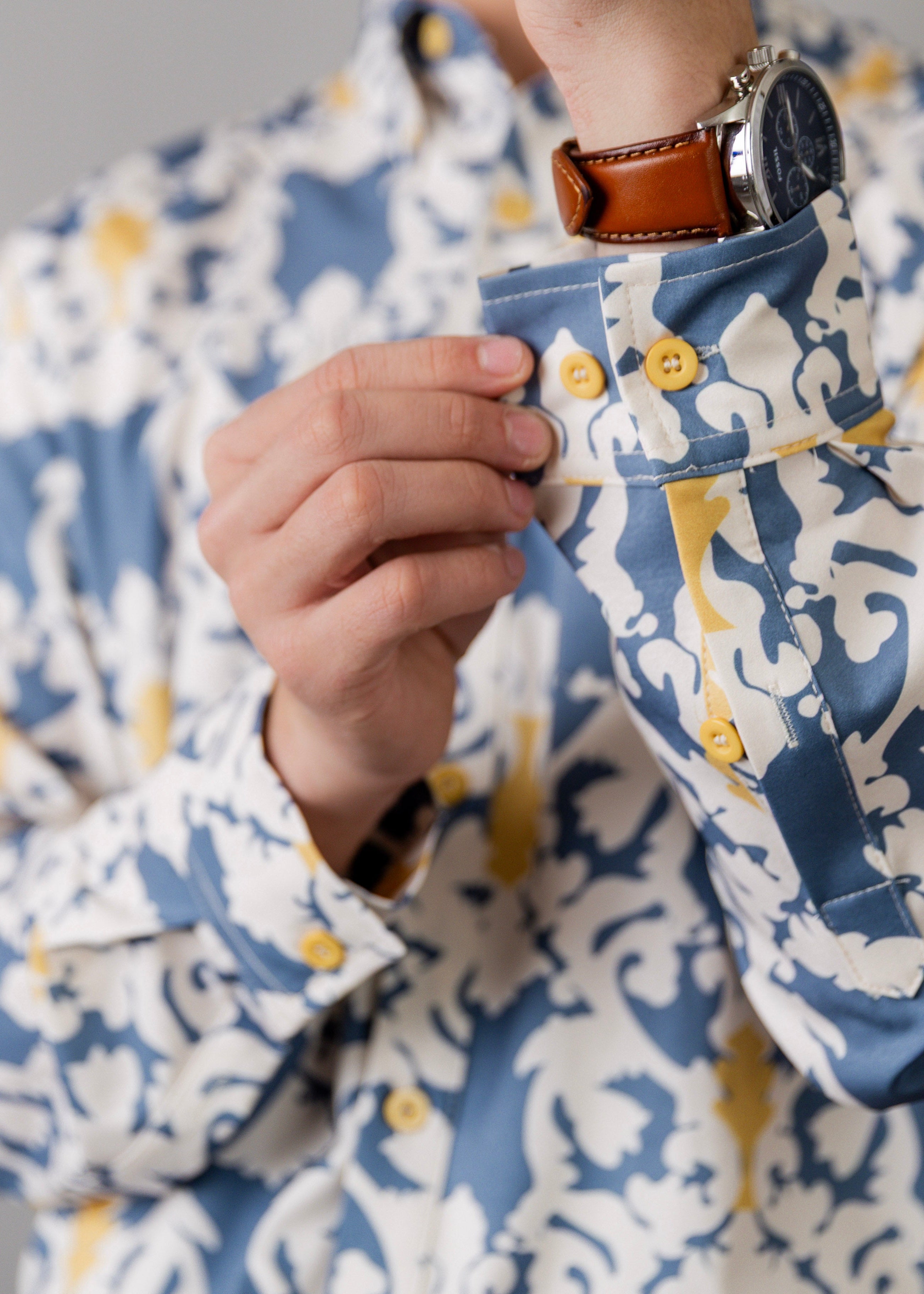 Model wearing Nuggles® Men's Button Down Shirt in Steel Damask