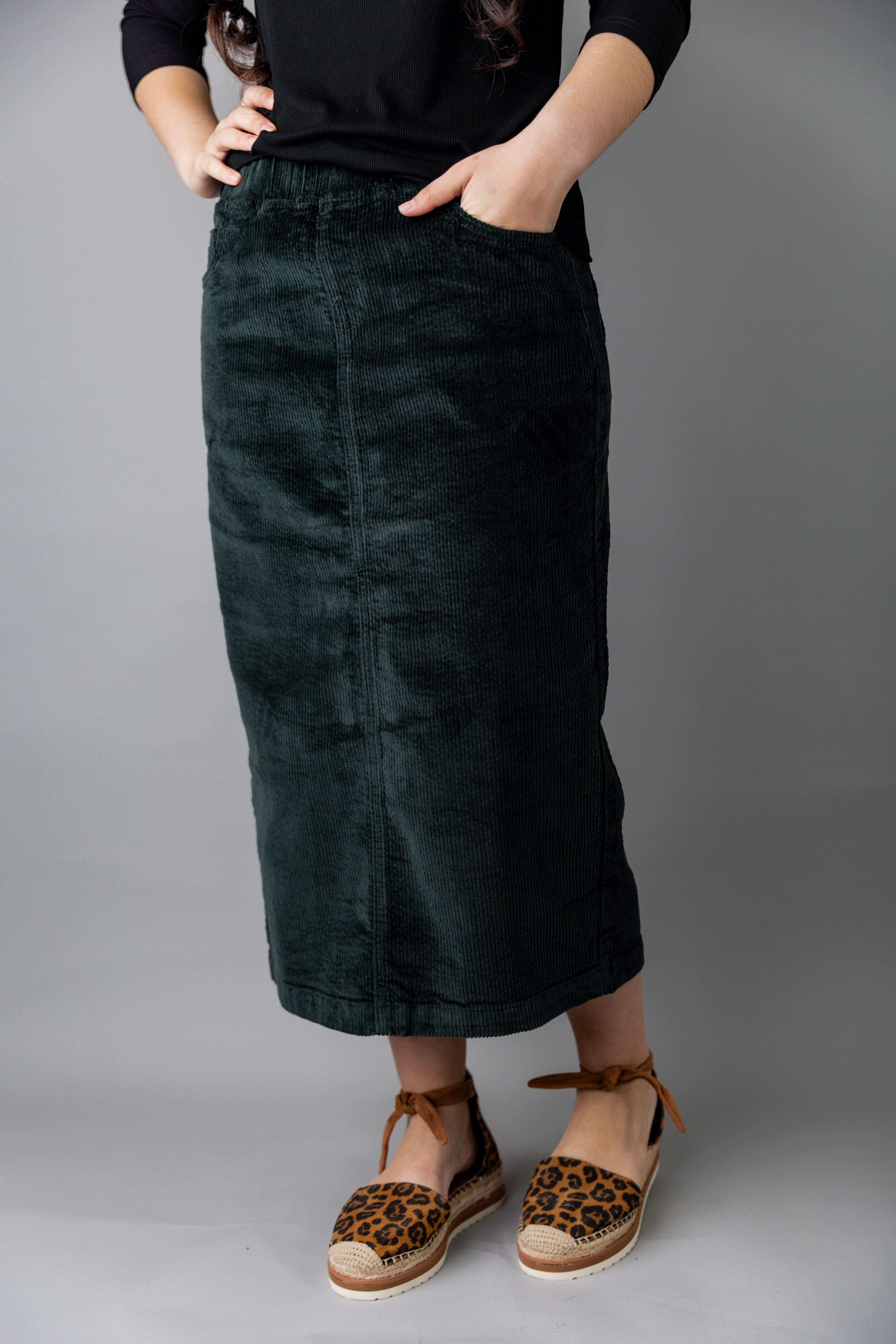 Model wearing Nuggles® 25-inch corduroy skirt