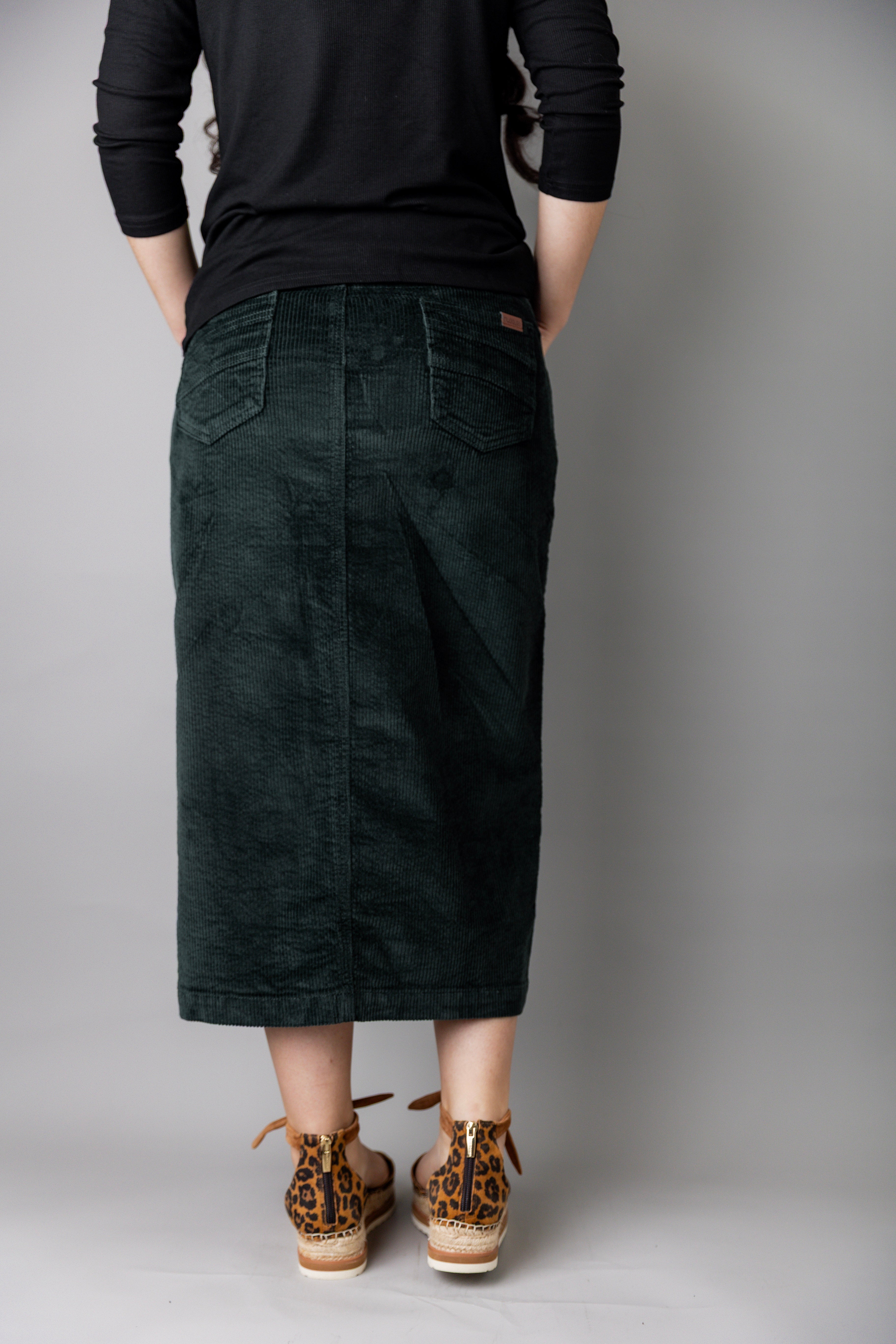 Model wearing Nuggles® 25-inch corduroy skirt