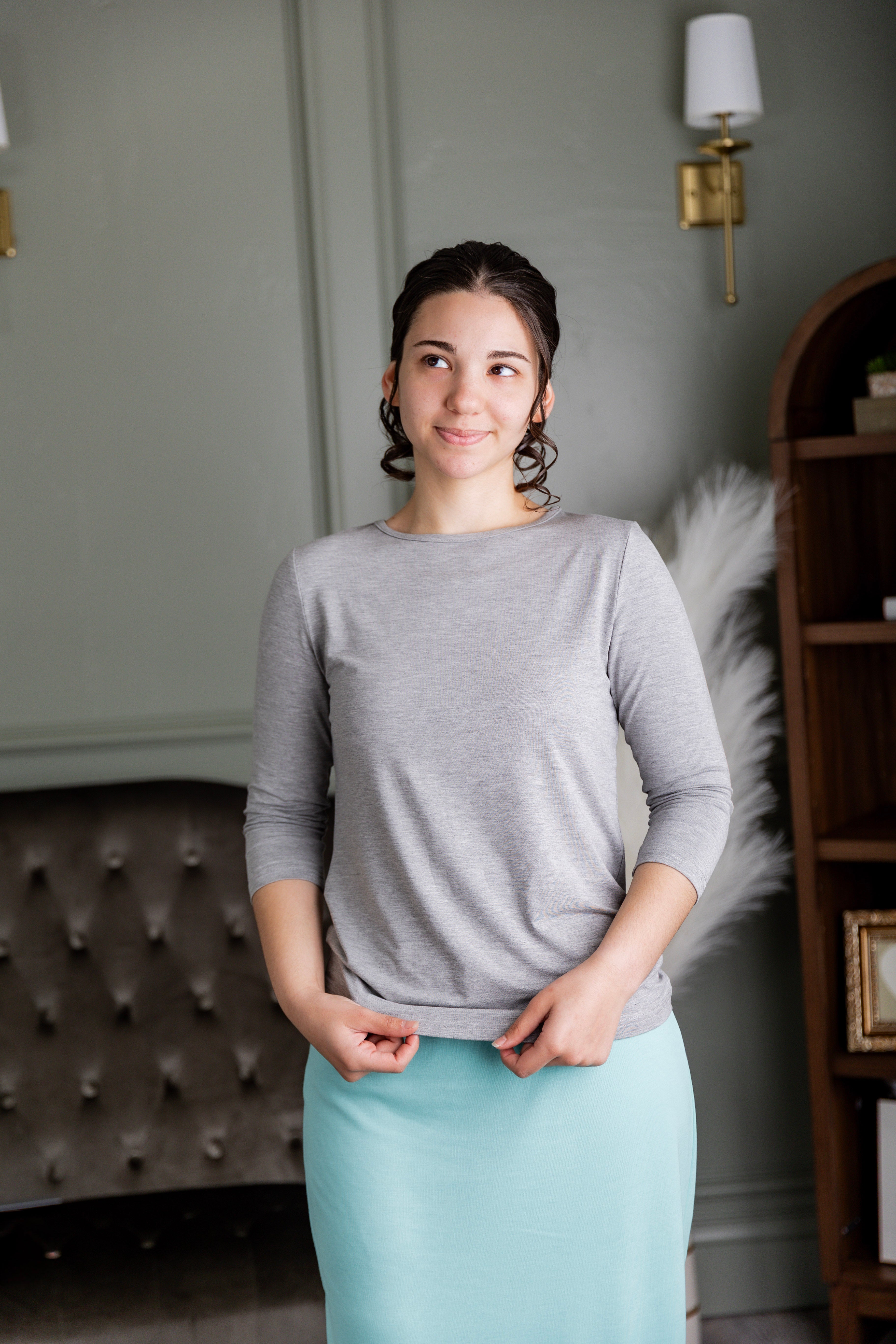 Model wearing our Nuggles® Essential 3/4 sleeve tee.