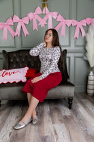 Model wearing Nuggles® 27" Relaxed Skirt in Brick Red